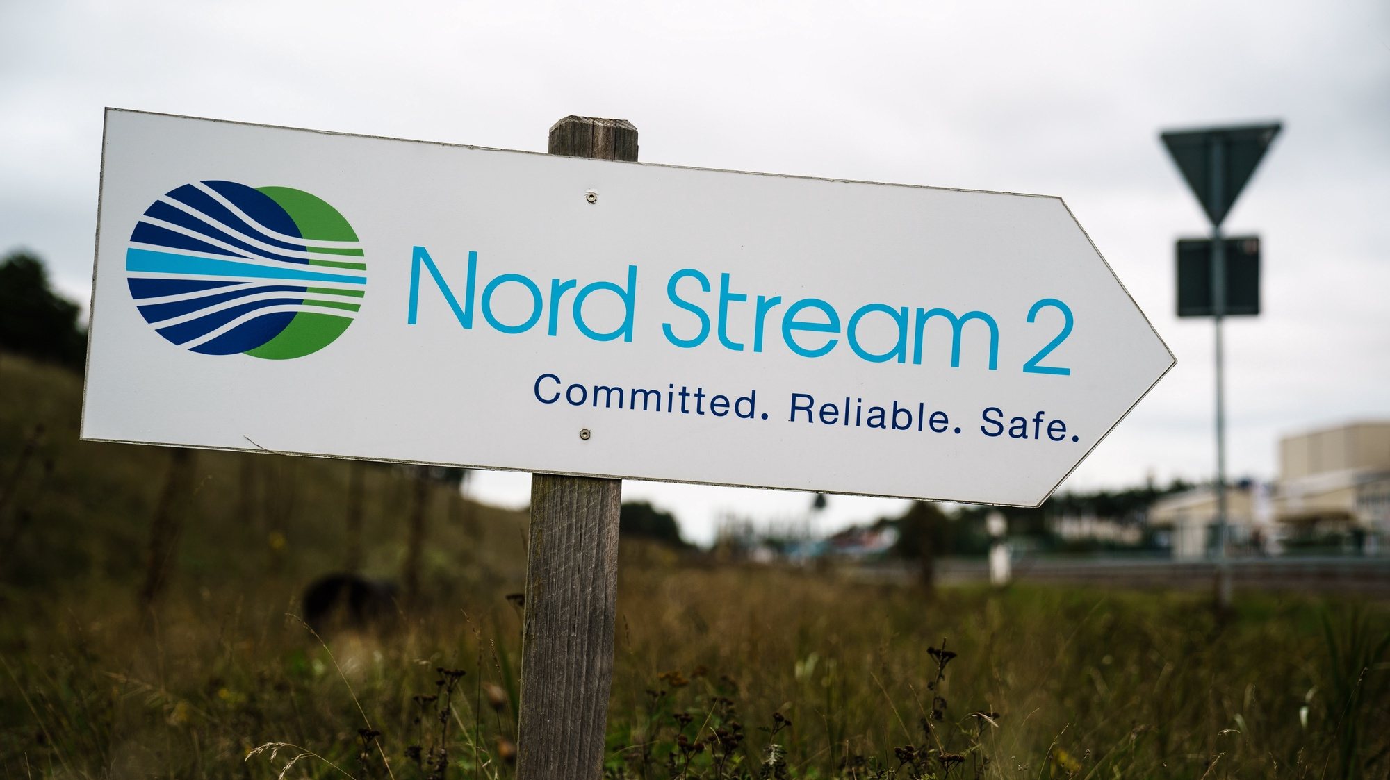 epa08748004 A sign reading ’Nord Stream 2 - Committed. Reliable. Safe.’ picutured near the pipeline landfall facility after a visit of Mecklenburg-Western Pomerania State Premier Manuela Schwesig (not in the picture) to the industrial port and the landfall facility of the joint German-Russian pipeline project Nord Stream 2, in Lubmin, Germany, 15 October 2020. The politically controversial pipeline project was put into question in response to the alleged poisoning of Kreml critic Alexei Navalny. Schwesig wants to save the gas pipeline that she regards an important infrastructure project.  EPA/CLEMENS BILAN