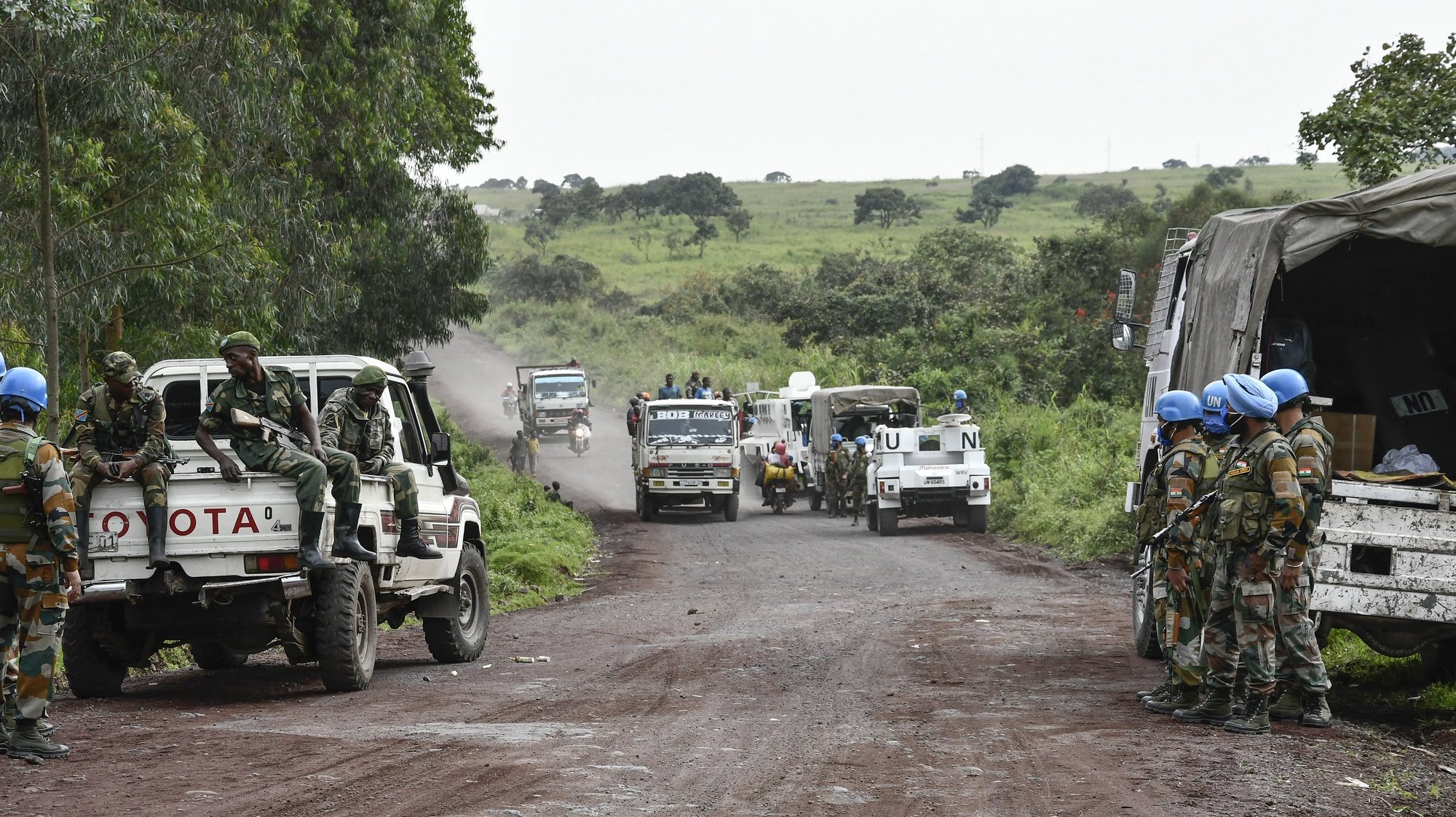 epa09030027 United Nations and Congo Armed Forces soldiers secure a road near the scene of an attack on the edge of the Virunga National Park where Italy&#039;s ambassador to the Democratic Republic of Congo and two others were killed, in Nyiragongo, North Kivu province,  Democratic Republic of Congo, 22 February 2021. According to the Italian Foreign Ministry, the Italian Ambassador to the DR Congo, Luca Attanasio, and a security member were killed in an apparent attack on a UN convoy near Goma, Democratic Republic of the Congo. A statement by the World Food Programme (WFP) said that a WFP driver was also among the dead.  EPA/STR