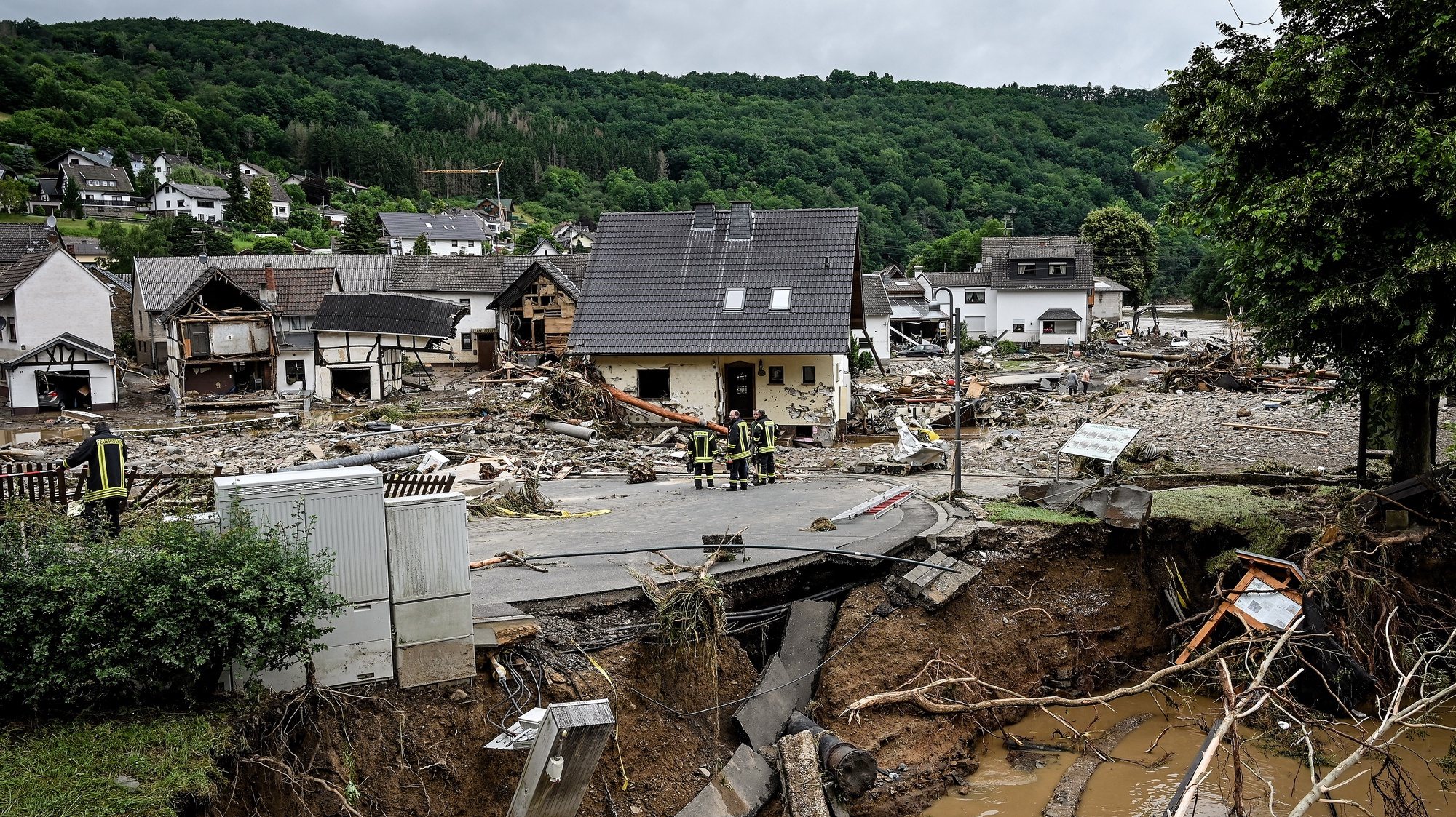 epa09346717 A view of the damage at village of Schuld in the district of Ahrweiler after heavy flooding of the river Ahr, in Schuld, Germany, 15 July 2021. Large parts of Western Germany were hit by heavy, continuous rain in the night to 14 July, resulting in local flash floods that destroyed buildings and swept away cars.  EPA/SASCHA STEINBACH