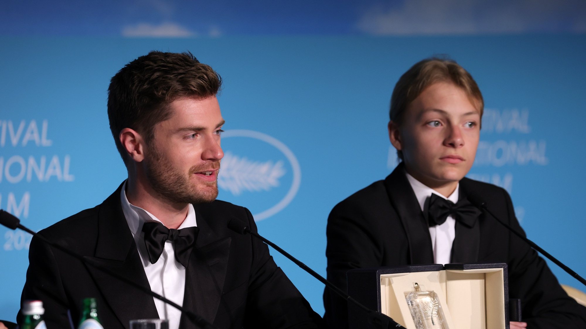 epa09983835 Director Lukas Dhont (L) and Eden Dambrine sit behind the Grand Prize Palme d&#039;Or Award for the movie &#039;Close&#039; at the Award Winners&#039; press conference within the Closing Ceremony of the 75th annual Cannes Film Festival, in Cannes, France, 28 May 2022  (issued 29 May 2022). The festival ran from 17 to 28 May.  EPA/JOHN PHILIPS / POOL *** Local Caption *** CANNES, FRANCE - MAY 28: &lt;&lt;enter caption here&gt;&gt; attends the Palme D&#039;or winner press conference during the 75th annual Cannes film festival at Palais des Festivals on May 28, 2022 in Cannes, France. (Photo by John Phillips/Getty Images)