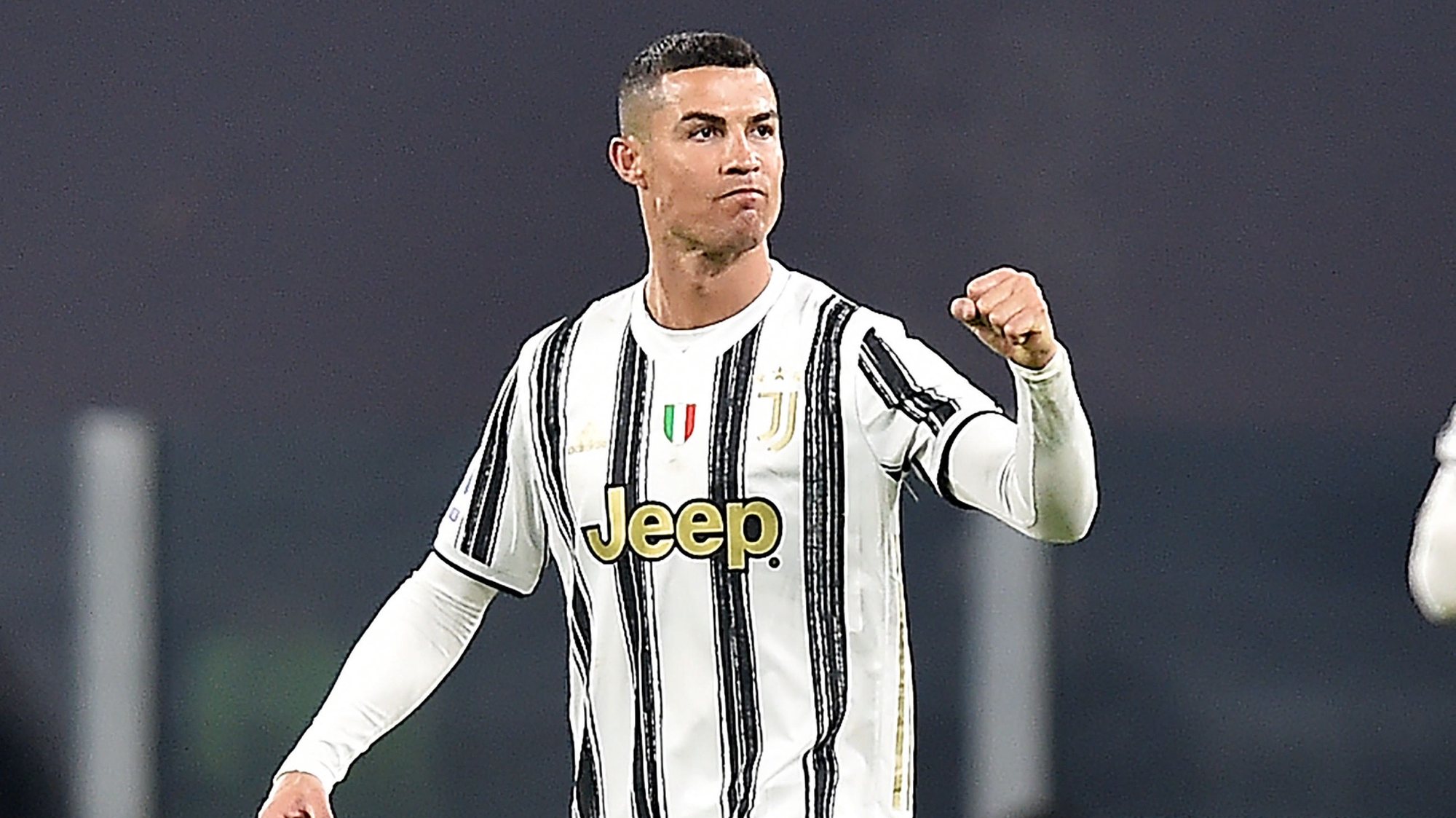 epa08917628 Juventusâ€™ Cristiano Ronaldo celebrates after scoring the the 1-0 goal during the Italian Serie A soccer match Juventus FC vs Udinese Calcio at the Allianz Stadium in Turin, Italy, 03 January 2021.  EPA/ALESSANDRO DI MARCO