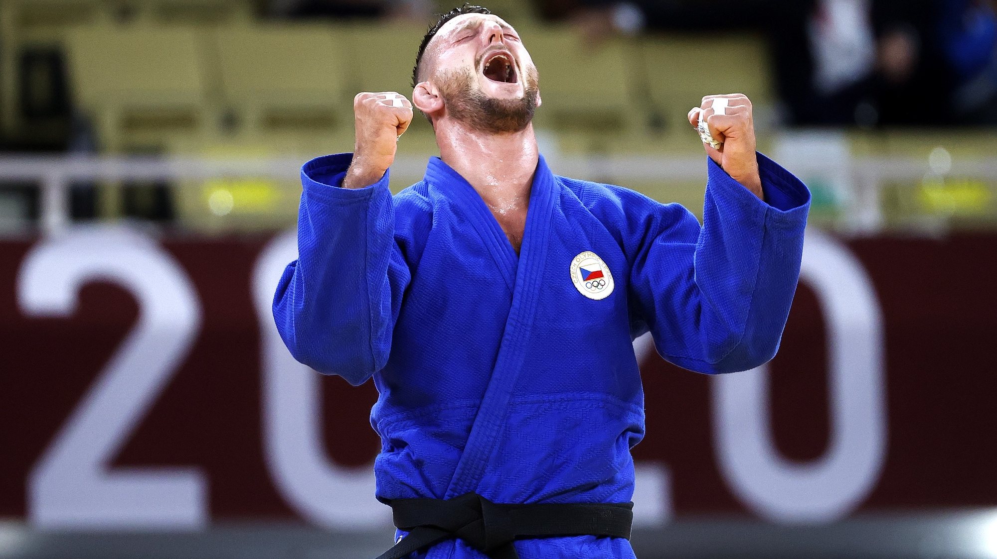 epa09379312 Luka Krpalek of Czech Republic reacts after defeating Hisayoshi Harasawa of Japan during the Men +100 kg Semifinal Table B contest at the Judo events of the Tokyo 2020 Olympic Games at the Nippon Budokan arena in Tokyo, Japan, 30 July 2021  EPA/RITCHIE B. TONGO