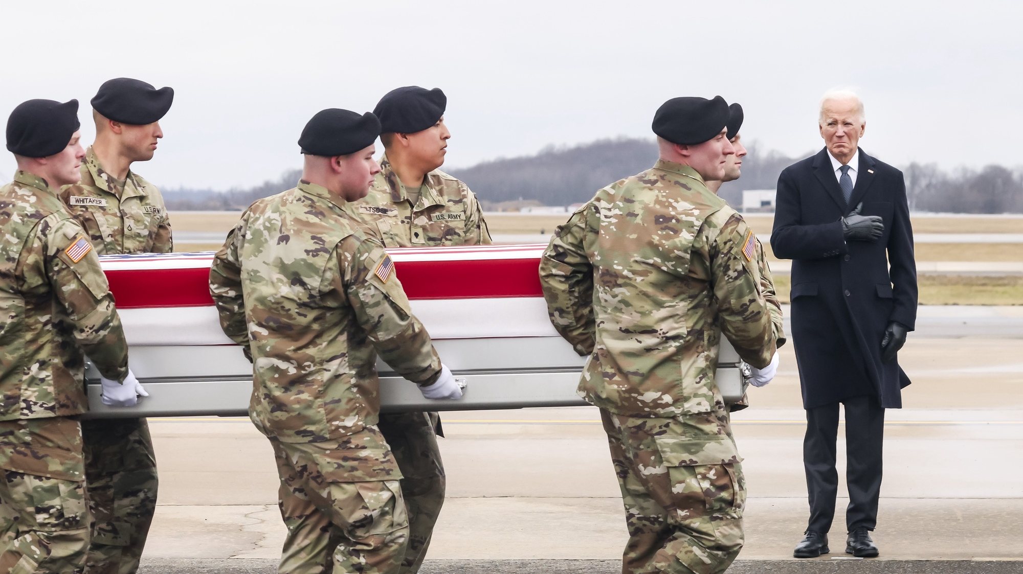 epa11121591 US President Joe Biden stands with his hand over his heart as a US Army carry team moves a flag-draped transfer case containing the remains of US Army Sergeant Breonna Moffett, during a dignified transfer of fallen US service members at Dover Air Force Base in Dover, Delaware, USA, 02 February 2024. US Army Sergeant Jerome Rivers. US Army Sergeant Breonna Moffett, and US Army Sergeant Kennedy Sanders died in a drone strike on 28 January at a military base in Jordan; forty other US troops were also injured in the attack. The enemy drone, which the White House has blamed on an Iran-backed militia, may have been mistaken for a US drone and left unimpeded, according to a preliminary report.  EPA/MICHAEL REYNOLDS
