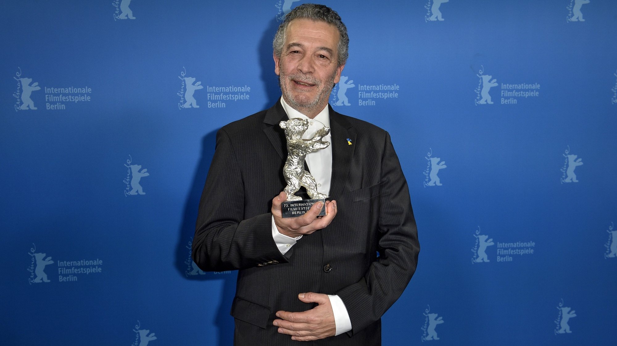 epa10491462 Joao Canijo poses with the Silver Bear Jury Prize during the Closing and Awards Ceremony of the 73rd Berlin International Film Festival &#039;Berlinale&#039; in Berlin, Germany, 25 February 2023. The in-person event ran from 16 to 26 February 2023.  EPA/MICHAEL TIMM / POOL