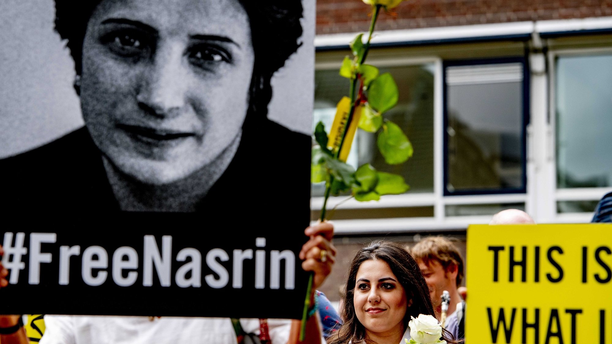 epa07615050 Supporters of Amnesty International take part in a campaign for the release of Iranian human rights lawyer Nasrin Sotoudeh by celebrating a birthday party in front of the Iranian embassy in The Hague, The Netherlands, 31 May 2019. According to reports, human rights lawyer Sotoudeh was sentenced in Iran to 38 years in prison and 148 lashes.  EPA/ROBIN UTRECHT