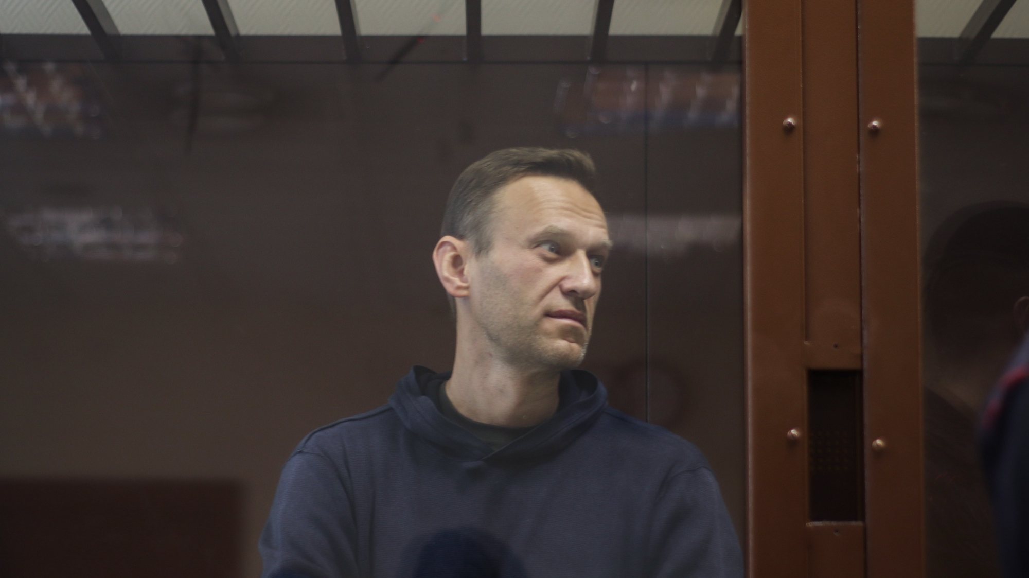 epa08988498 A handout photo made available by the Press Service of the Babushkinsky district court shows Russian opposition leader Alexei Navalny during a hearing of a case on slander charges in Moscow, Russia, 05 February 2021. In June 2020 the Russian Investigative Committee opened a criminal case against Alexei Navalny on charges of slander against WWII veteran Ignat Artemenko after Navalny’s comment about a video promoting the amendments to the Russian Constitution.  EPA/BABUSHKINSKY DISTRICT COURT PRESS SERVICE / HANDOUT  HANDOUT EDITORIAL USE ONLY/NO SALES