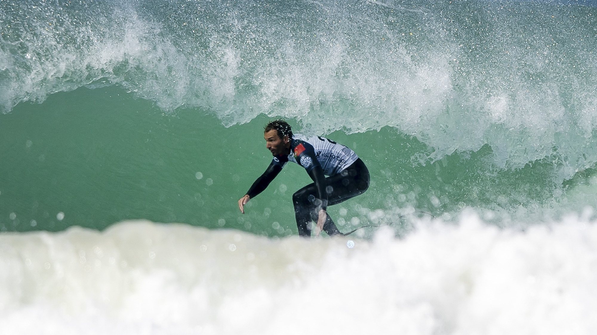 epa09805686 Portuguese surfer Frederico Morais in action during his round of 16 heat at the Meo Pro Portugal surfing event as part of the World Surf League (WSL) World Tour at Supertubos beach in Peniche, Portugal, 06 March 2022.  EPA/JOSE SENA GOULAO