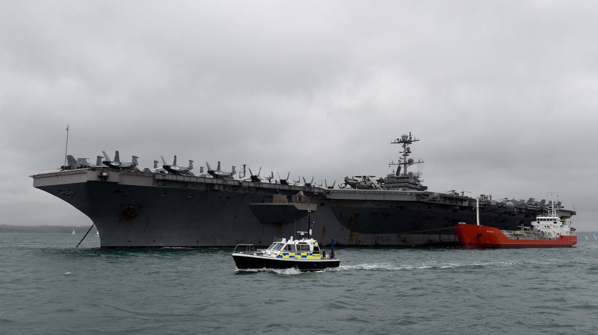 epa07074150 A general view of USS Harry S. Truman Navy in Portsmouth Britain, 06 October 2018. The USS Harry S. Truman is named after the 33rd President of the United States and is the ninth nuclear powered aircraft carrier. The ship is 1.096 feet long, 20 stories high form the waterline and and has area of flying deck of 4.5 acres. Harry S. Truman can reach a top speed of 30+ knots and has a crew of 5,000 plus.  EPA/FACUNDO ARRIZABALAGA