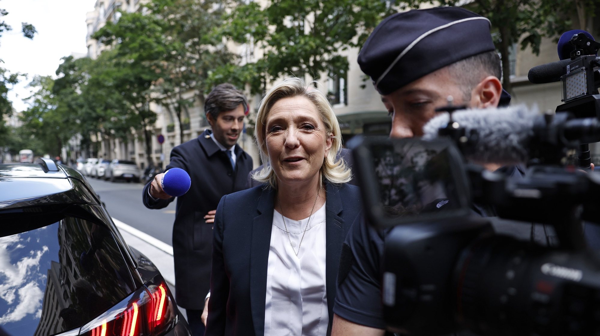 epa11457116 French Member of Parliament for the far-right Rassemblement National (RN) party, Marine Le Pen (C) arrives at the party headquarter in Paris, France, 04 July 2024. France&#039;s far right National Rally has made significant gains in the first round of parliamentary elections. The second round of the elections for a new Parliament is to be held on 07 July 2024.  EPA/YOAN VALAT