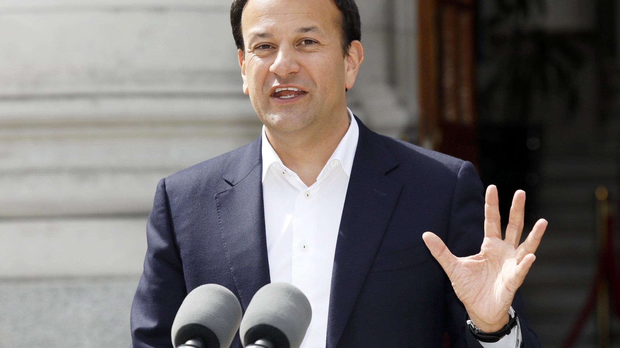 epa08452561 Irish Prime Minister An Taoiseach Leo Varadkar gestures outside Government Buildings in Dublin, Ireland, 29 May 2020, as he briefed media on topics including Brexit and the response to the ongoing pandemic of the COVID-19 disease caused by the SARS-CoV-2 coronavirus following a Cabinet meeting.  EPA/Photocall Ireland / POOL