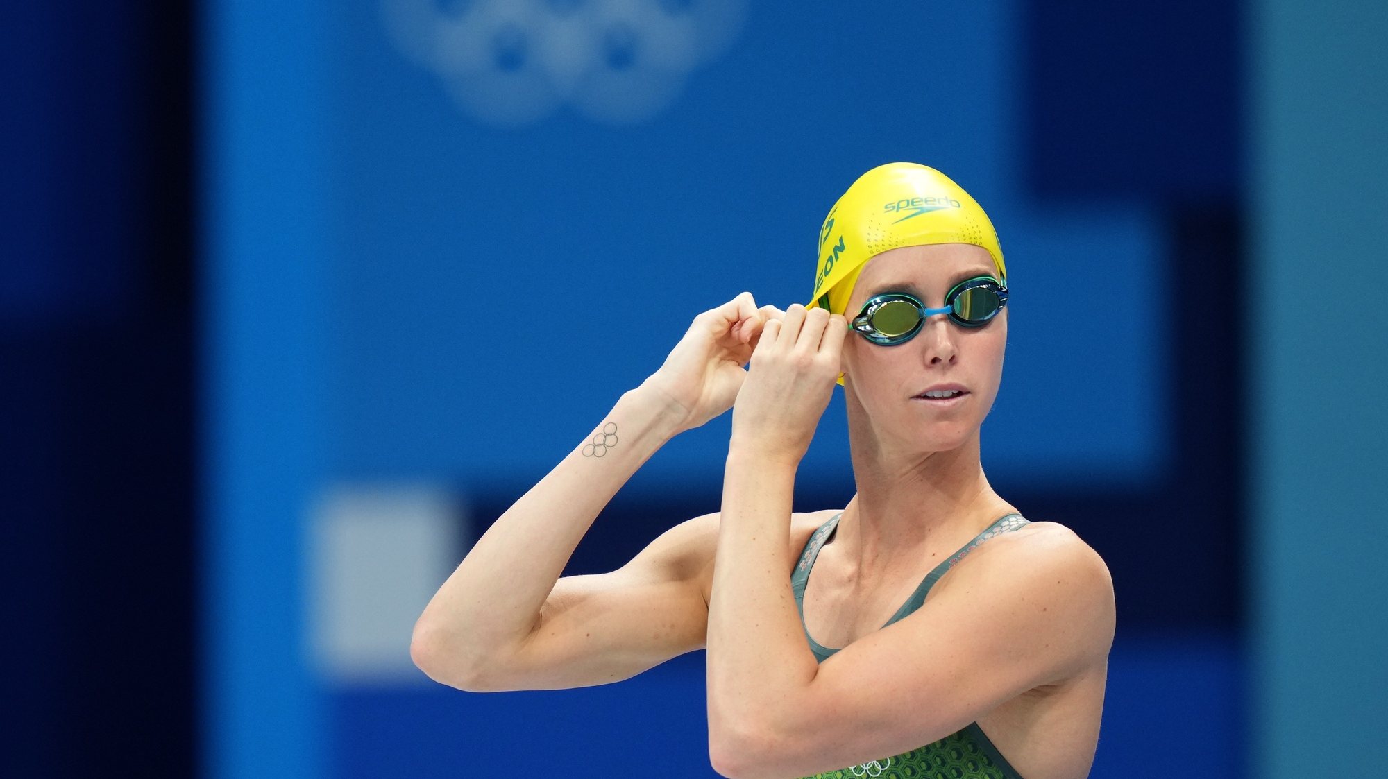 epa09365724 Emma McKeon of Australia prepares before her Bronze medal swim in the Women&#039;s 100m Butterfly Final during the Tokyo Olympic Games, at the Tokyo Aquatics Centre in Tokyo, Japan, 26 July 2021.  EPA/JOE GIDDENS AUSTRALIA AND NEW ZEALAND OUT