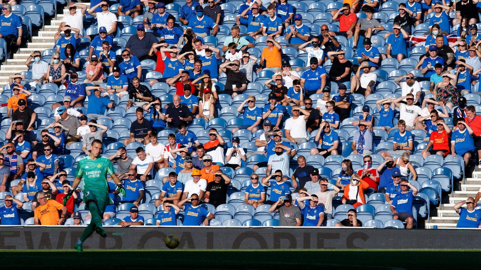 epa09365515 Rangers fans attend the pre-season friendly test soccer match between Glasgow Rangers and Real Madrid at Ibrox Stadium in Glasgow, Britain, 25 July 2021.  EPA/Robert Perry