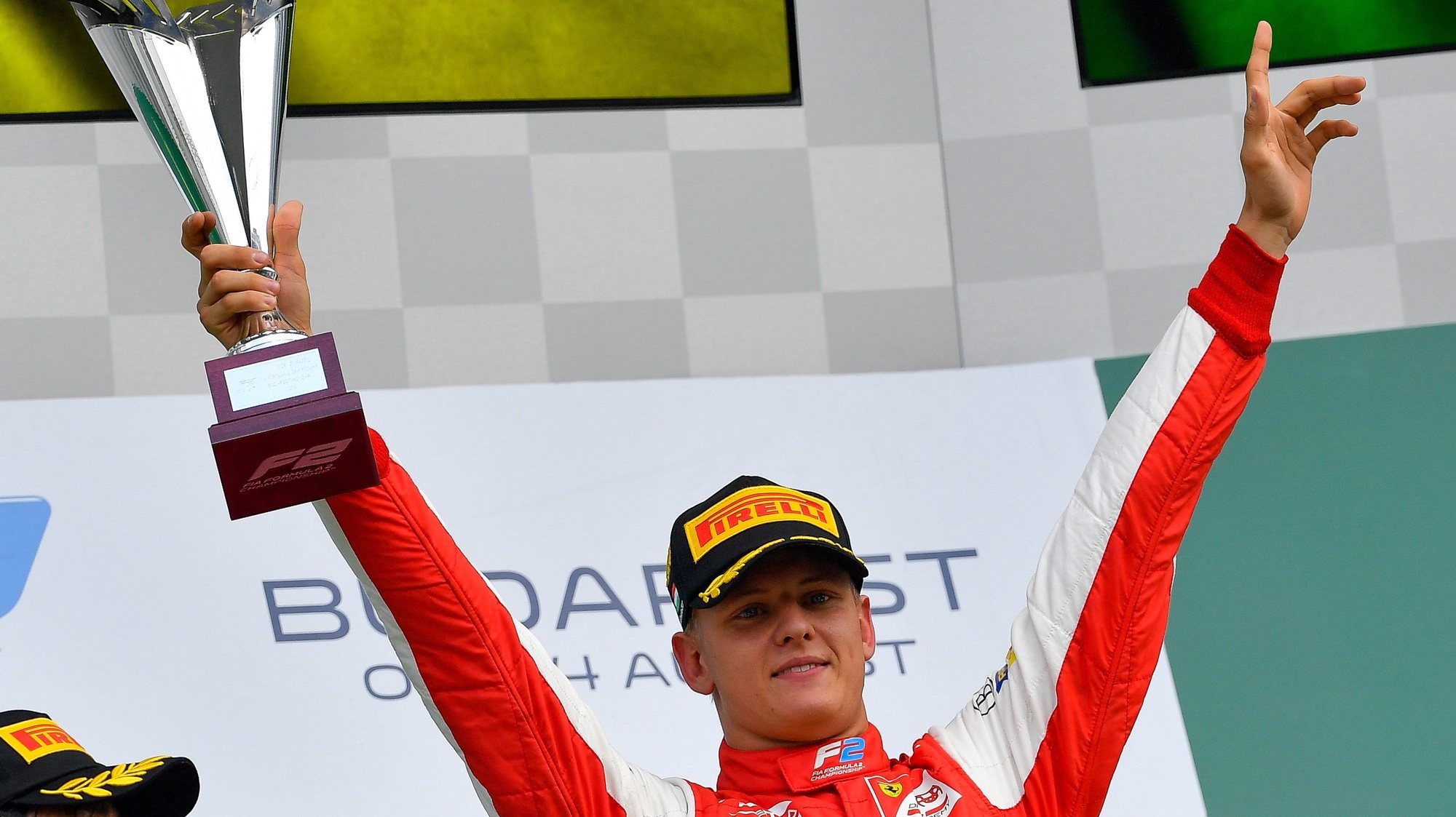 epa08856475 (FILE) Winner German Formula Two driver Mick Schumacher of PREMA Racing celebrates his victory after the second race of the Formula-2 at the Hungaroring circuit, in Mogyorod, Hungary, 04 August 2019.  (reissued 02 December 2020). Mick Schumacher, the son of seven-time Formula 1 world champion Michael, has signed to race for F1 team Haas next season, it was announced 02 December 2020.  EPA/Zsolt Czegledi HUNGARY OUT *** Local Caption *** 55377885