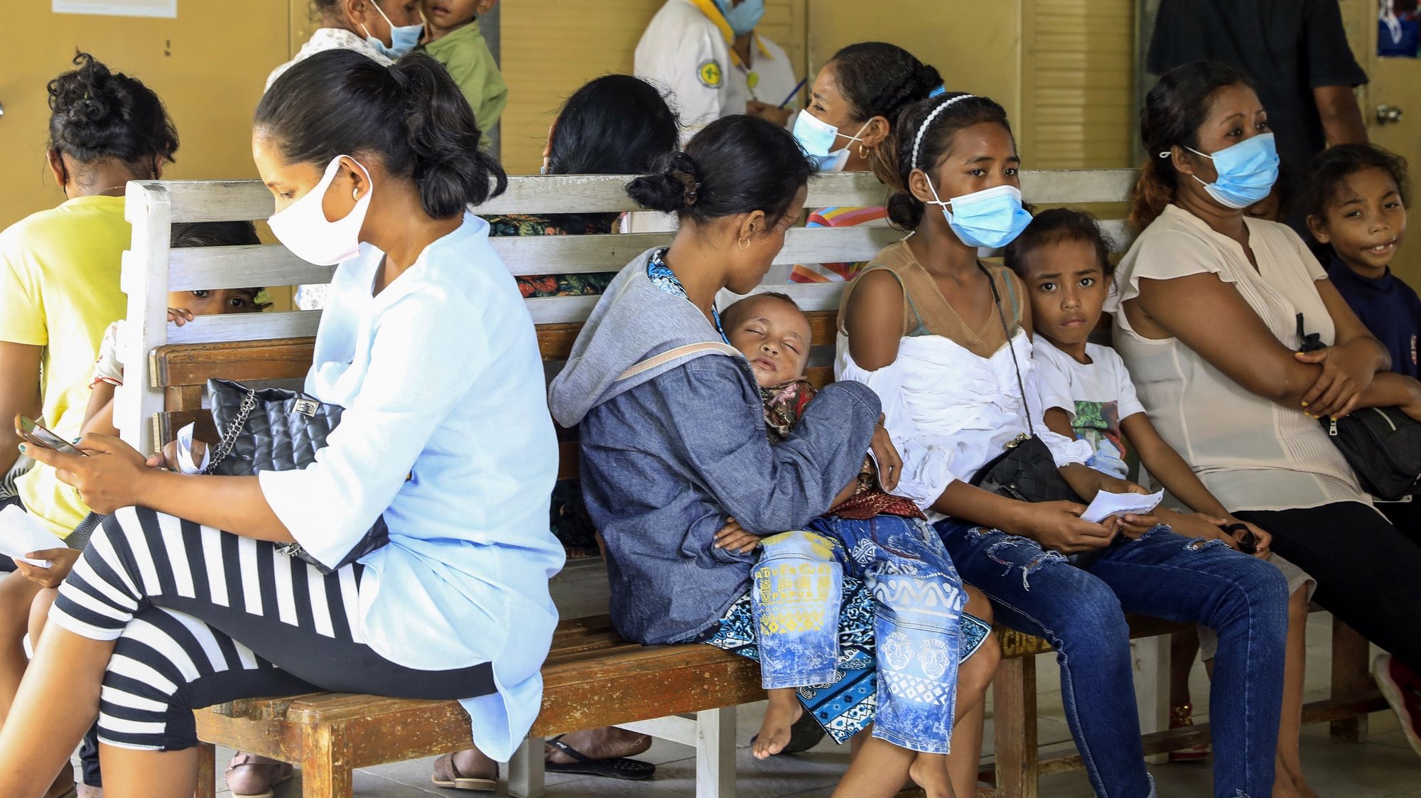epa08936478 People wait for their turn to get a medical check up amid the ongoing COVID-19 pandemic at a clinic in Dili, East Timor, also known as Timor Leste, 07 January 2021 (issued 14 January 2021). According to reports Timor Leste is considered successful in overcoming the pandemic and recorded as the second-smallest outbreak in Southeast Asia after Laos. Timor Leste has 49 cases with zero death while the neighbouring country Indonesia is struggling as one of the worst outbreaks in the region. The country imposed a state of emergency a week after the Catholic-majority nation reported its first case on 21 March 2020, and enforced strict border controls.  EPA/ANTONIO DASIPARU