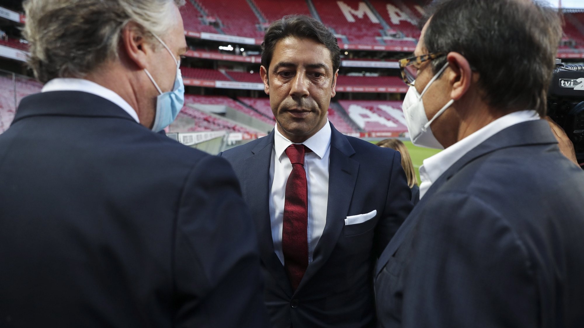 epa09334697 Former Portuguese player Rui Costa (C) is greeted by club officials after being appointed new president of Portuguese soccer club Benfica in Lisbon, Portugal. 09 July 2021. Rui Costa replaced Luis Filipe Vieira, who suspended his duties after he was detained as part of an investigation into alleged tax fraud and money laundering.  EPA/MIGUEL A. LOPES