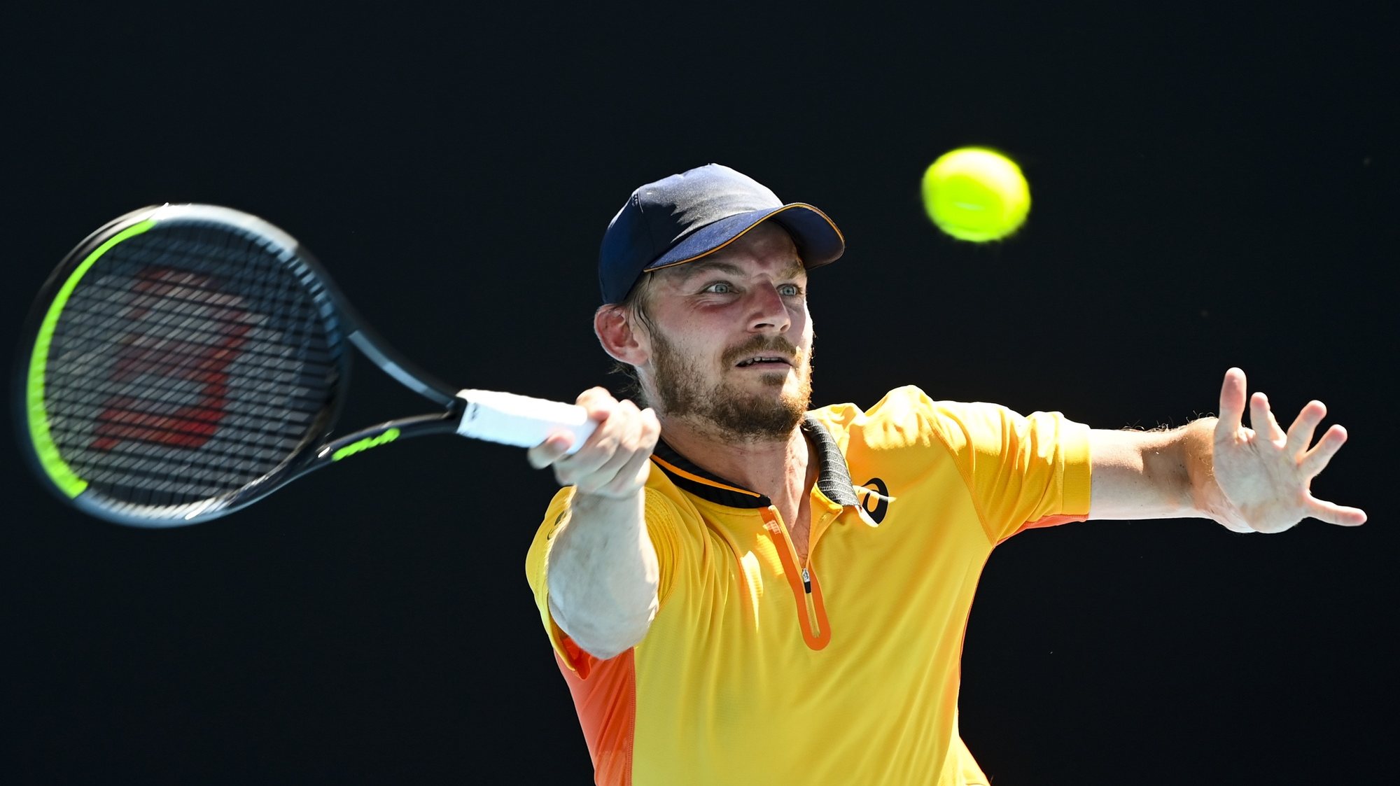 epa08997827 David Goffin of Belgium in action during his first Round Men&#039;s singles match against Alexei Popyrin of Australia on Day 2 of the Australian Open at Melbourne Park in Melbourne, Australia, 09 February 2021.  EPA/DAVE HUNT AUSTRALIA AND NEW ZEALAND OUT
