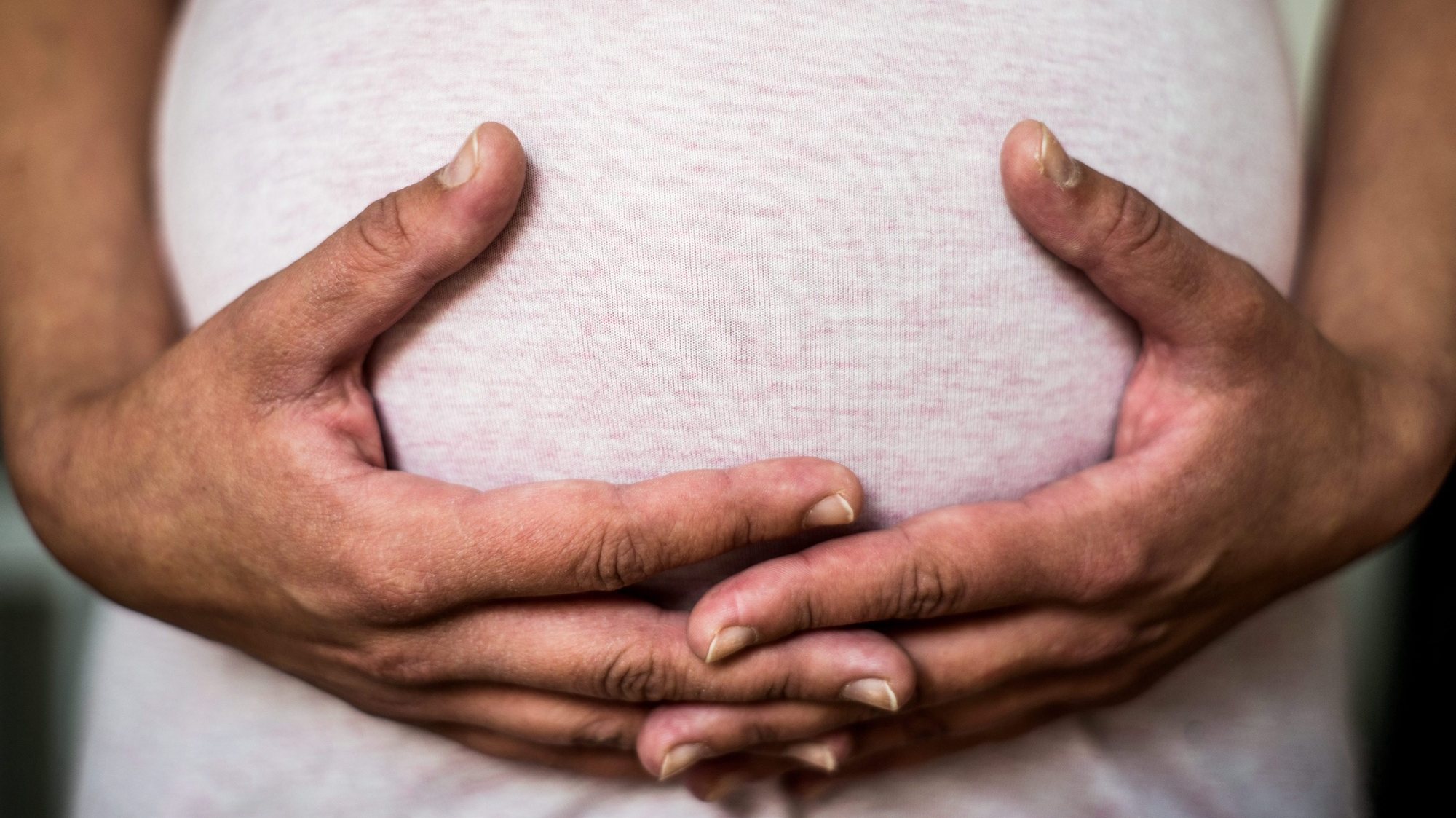 epa05286806 (01/15) A pregnant woman holds her belly at Lea Mothers&#039; Home in Erd, Hungary, 30 April 2016. The Lea Home assists many of these young women who are under crisis while becoming mothers, and supports them to get ready to live the life of a normal family. One of the main tasks of the home is to grant babies a peaceful and suitable place to come into the world in decent circumstances. It also helps babies and young mothers to stay together after the successful delivery despite of their disadvantageous backgrounds.  EPA/ZOLTAN BALOGH PLEASE REFER TO THIS ADVISORY NOTICE (epa05286805) FOR FULL PACKAGE TEXT; HUNGARY OUT