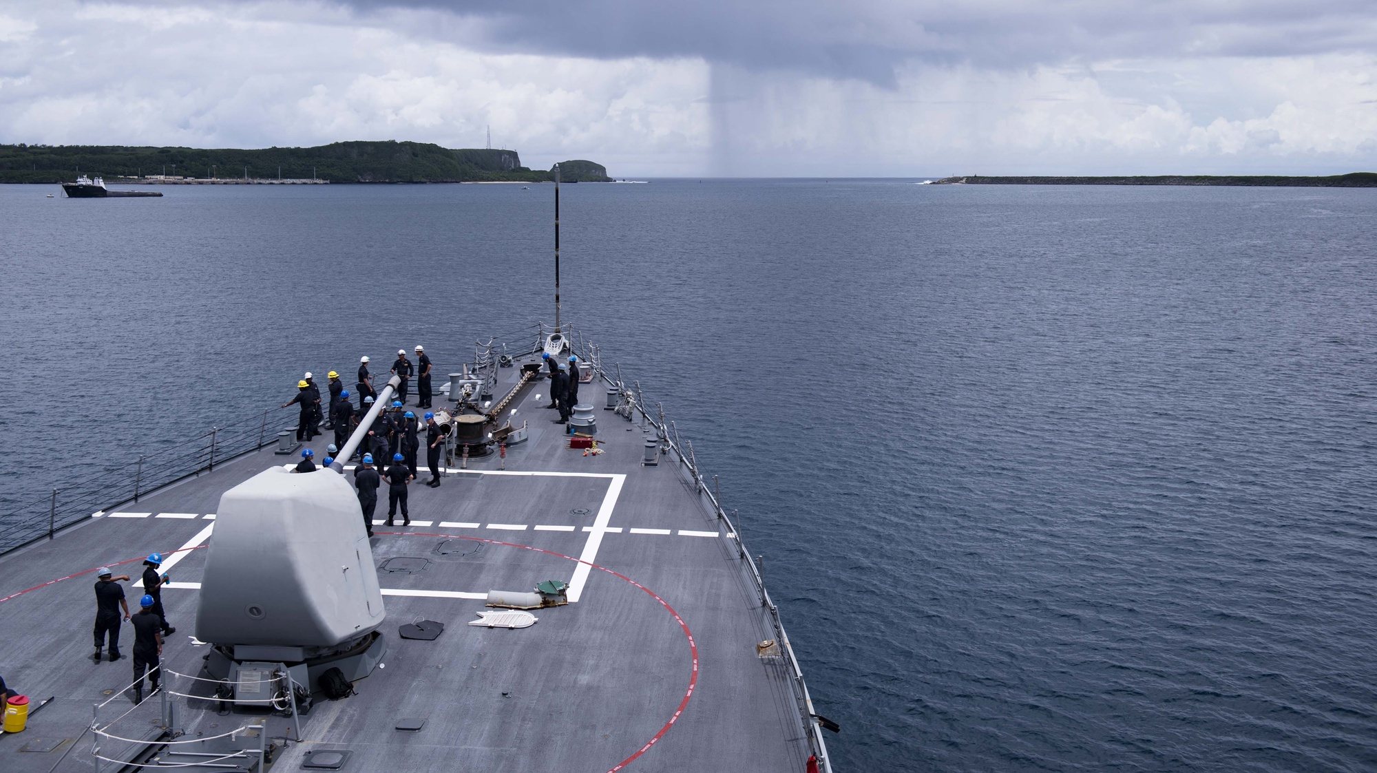 epa06802627 A handout photo made available by the US Navy on 12 June 2018 shows the Arleigh Burke-class guided-missile destroyer USS Benfold (DDG 65) departing from Apra Harbor, Guam, 11 June 2018, for the at-sea portion of Exercise Malabar 2018. Malabar 2018 is designed to advance military-to-military coordination in a multinational environment between the US, Japan and Indian maritime forces.  EPA/US NAVY/MC2 ANNA VAN NUYS HANDOUT  HANDOUT EDITORIAL USE ONLY/NO SALES