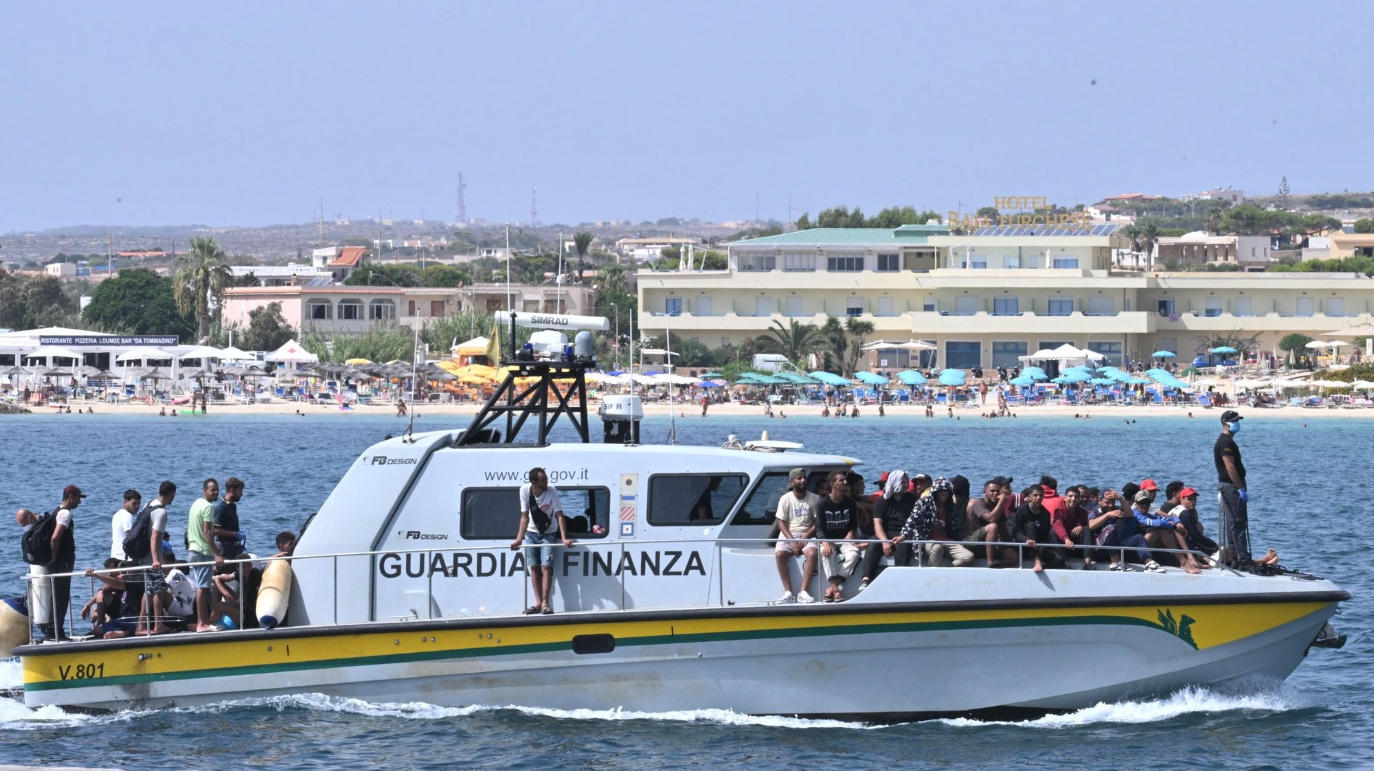 epa10869371 77 migrants from Egypt, Bengal, Syria, Ethiopia, and Sudan arrive from Tunsia in Lampedusa after their two boats were rescued by the Guardia di Finanza V827 patrol boat, 19 September 2023, Lampedusa, Italy. According to Italy&#039;s Interior Ministry, nearly 126,000 immigrants and refugees have entered the country as of 2023, more than twice as many as during the same time period in 2022.  EPA/CIRO FUSCO