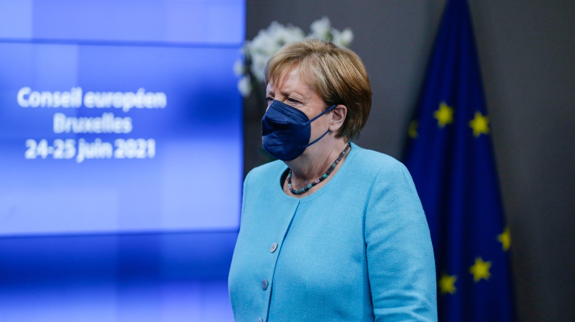 epa09299939 German Chancellor Angela Merkel leaves at the end of the first day of a European Union leaders meeting in Brussels, Belgium, 24 June 2021. EU leaders meet in Brussels for two days to discuss COVID-19, economic recovery, migration and external relations.  EPA/ARIS OIKONOMOU / POOL