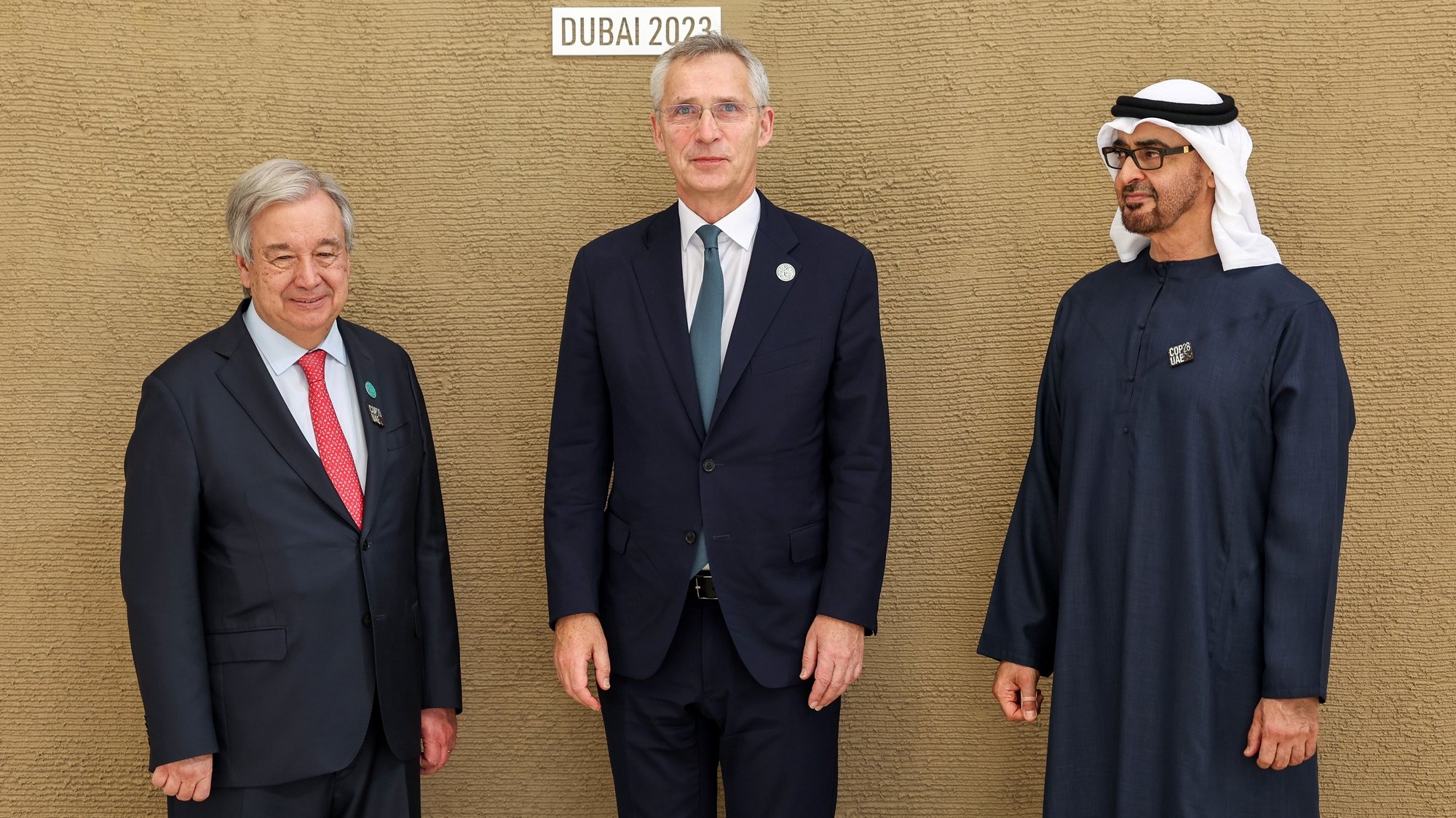 epa11005282 A handout photo made available by the UN Press Office shows (L-R) United Nations Secretary-General Antonio Guterres, Jens Stoltenberg, Secretary General of NATO, and Mohamed bin Zayed Al Nahyan, President of the United Arab Emirates and ruler of Abu Dhabi, posing for a photo during the UN Climate Change Conference COP28, in Dubai, United Arab Emirates, 01 December 2023. The 2023 United Nations Climate Change Conference (COP28), runs from 30 November to 12 December, and is expected to host one of the largest number of participants in the annual global climate conference as over 70,000 estimated attendees, including the member states of the UN Framework Convention on Climate Change (UNFCCC), business leaders, young people, climate scientists, Indigenous Peoples and other relevant stakeholders will attend.  EPA/MAHMOUD KHALED/ UN PRESS OFFICE / HANDOUT  HANDOUT EDITORIAL USE ONLY/NO SALES HANDOUT EDITORIAL USE ONLY/NO SALES