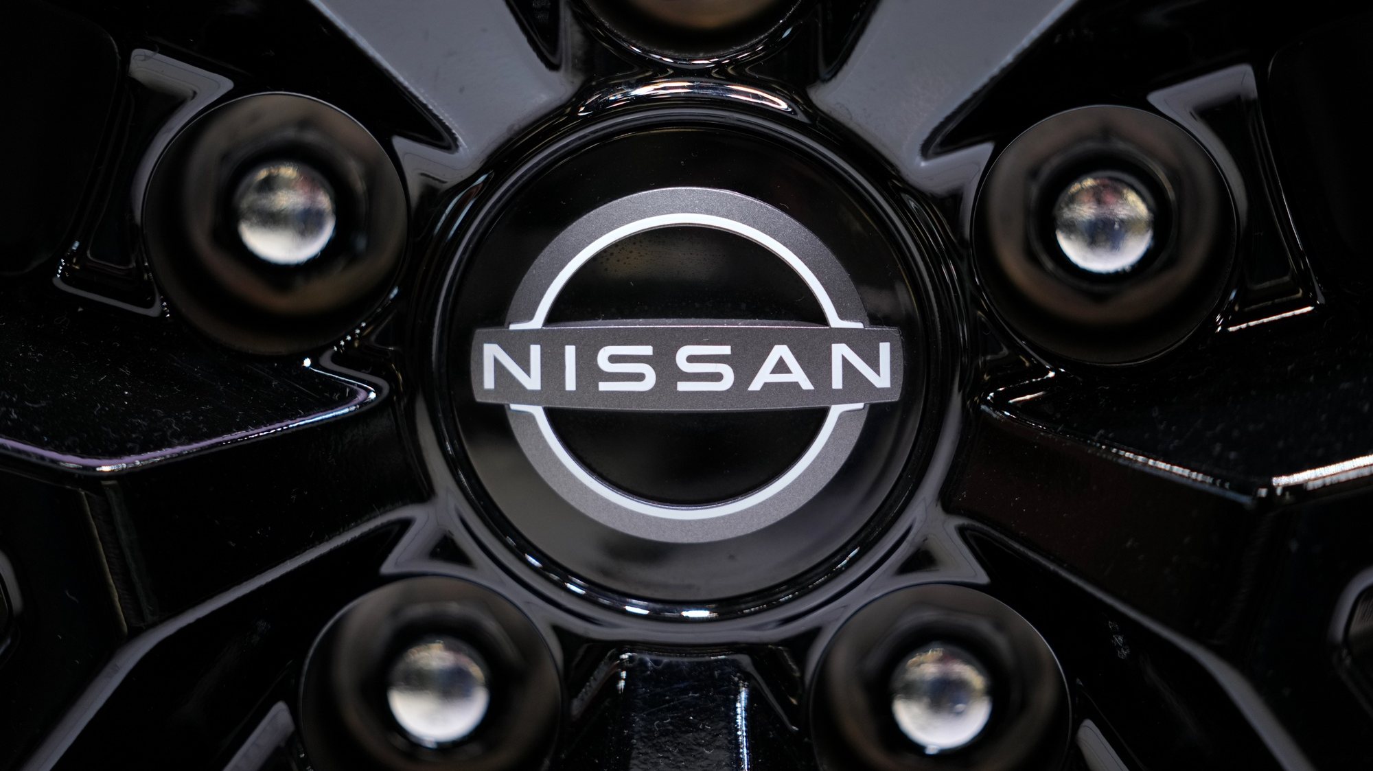 epa11206020 The logo of Nissan Motor Co., Ltd. is seen on a wheel of a car at a showroom in Tokyo, Japan, 08 March 2024. Japan&#039;s Fair Trade Commission announced on 07 March 2024 that it warned Nissan Motor Co., Ltd. over unfair reduction of payments to subcontracting auto parts suppliers. Nissan has unfairly lowered the delivery prices paid to 36 subcontractors for the production of passenger car parts, violating the Subcontract Act. The total reduction amounted to about three billion yen (around 20.28 million US dollar), making it the highest amount ever for a violation recommendation based on the law.  EPA/KIMIMASA MAYAMA