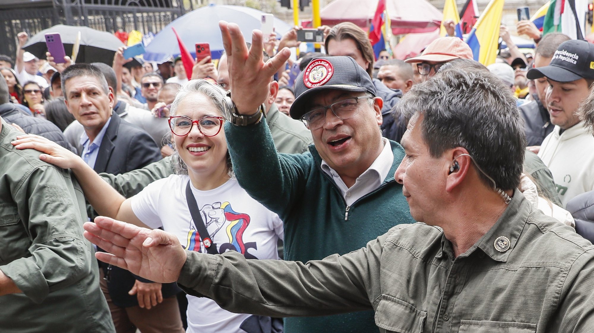 epa11312866 Colombian President Gustavo Petro (C), accompanied by Senator Maria Jose Pizarro (C-L), gestures during a march marking International Workers&#039; Day in Bogota, Colombia, 01 May 2024. Social and union organizations commemorate International Workers&#039; Day with demonstrations to demand labor and salary improvements for workers.  EPA/Carlos Ortega