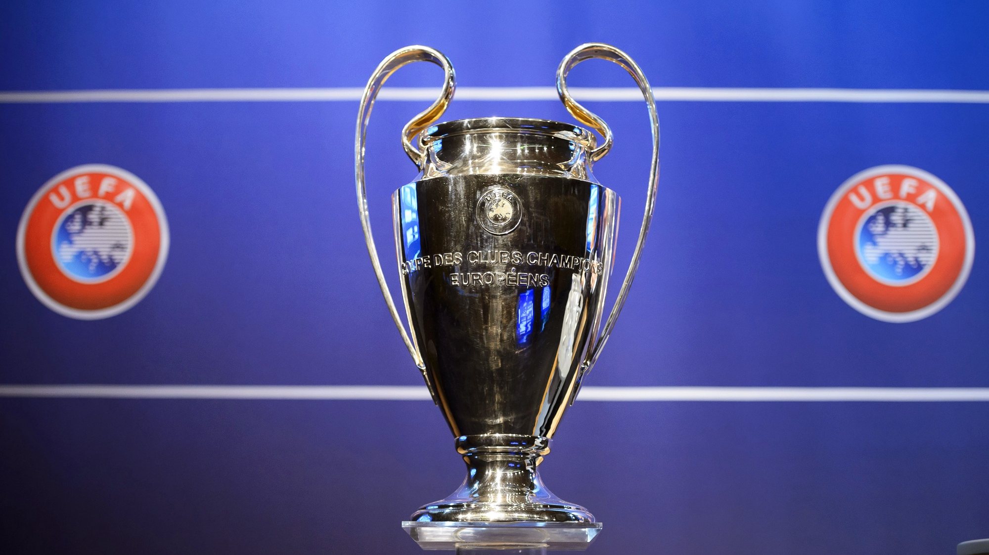 epa09145514 (FILE) - The Champions League trophy on display during the draw of the first two qualifying rounds of the UEFA Champions League 2014/15 at the UEFA Headquarters in Nyon, Switzerland, 23 June 2014 (reissued 19 April 2021). The UEFA Executive Committee approved on 19 April 2021 a new format for its club competitions, the UEFA Champions League, UEFA Europa League and UEFA Europa Conference League, as of the 2024/25 season  EPA/LAURENT GILLIERON *** Local Caption *** 55976087