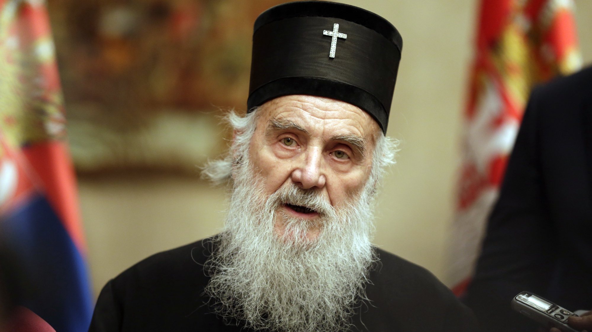 epa08830328 (FILE) - Serbian Orthodox Church Patriarch Irinej talks to members of the media in Belgrade, Serbia, 15 March 2020 (reissued 20 November 2020). According to media reports Patriarch Irinej died on 20 November 2020 in Belgrade, Serbia at the age of 90 after being admitted to a hospital for having symptoms of Covid-19 disease.  EPA/ANDREJ CUKIC