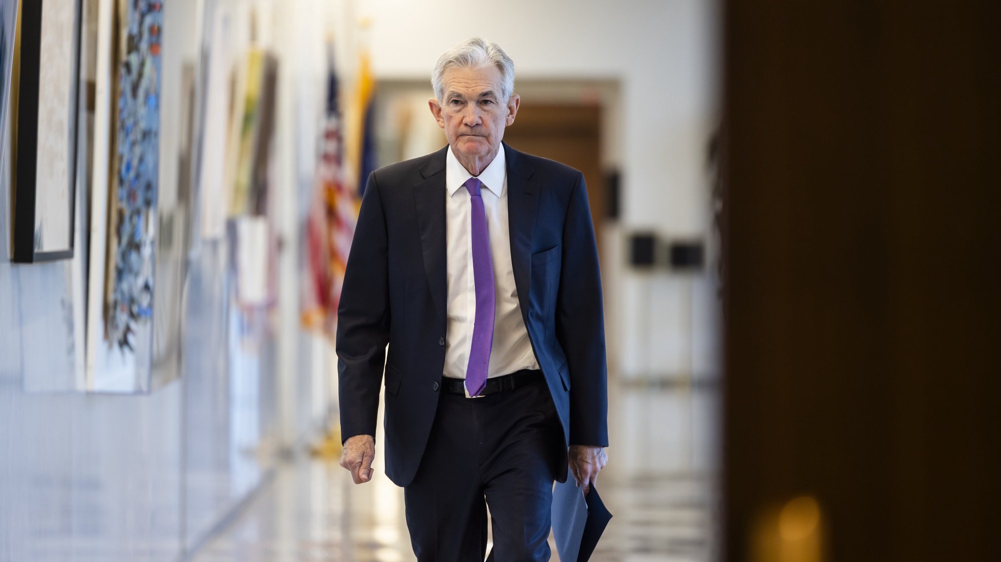 epa11236716 Chair of the Federal Reserve Jerome Powell prepares to attend a listening session about the post-pandemic economy at the Federal Reserve in Washington, DC, USA, 22 March 2024. The Fed left interest rates unchanged on 20 March, but signaled they plan three rate cuts later in 2024.  EPA/JIM LO SCALZO