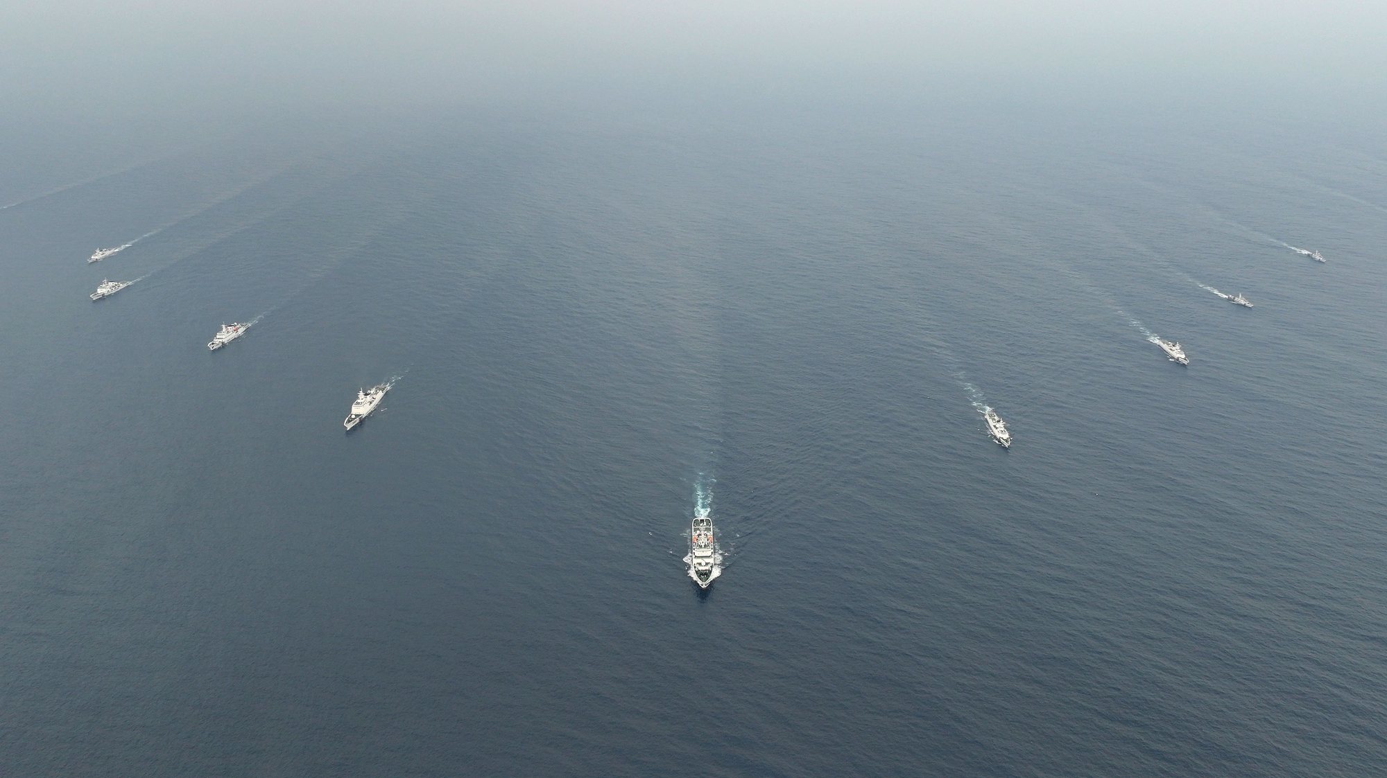 epa11349307 An aerial photo taken with a drone shows the China Coast Guard (CCG) 3502 fleet conducting formation training in waters adjacent to China&#039;s Huangyan Dao, South China Sea, 17 May 2024 (issued 18 May 2024).  EPA/XINHUA / Wang Yuguo CHINA OUT / UK AND IRELAND OUT  /       MANDATORY CREDIT  EDITORIAL USE ONLY  EDITORIAL USE ONLY