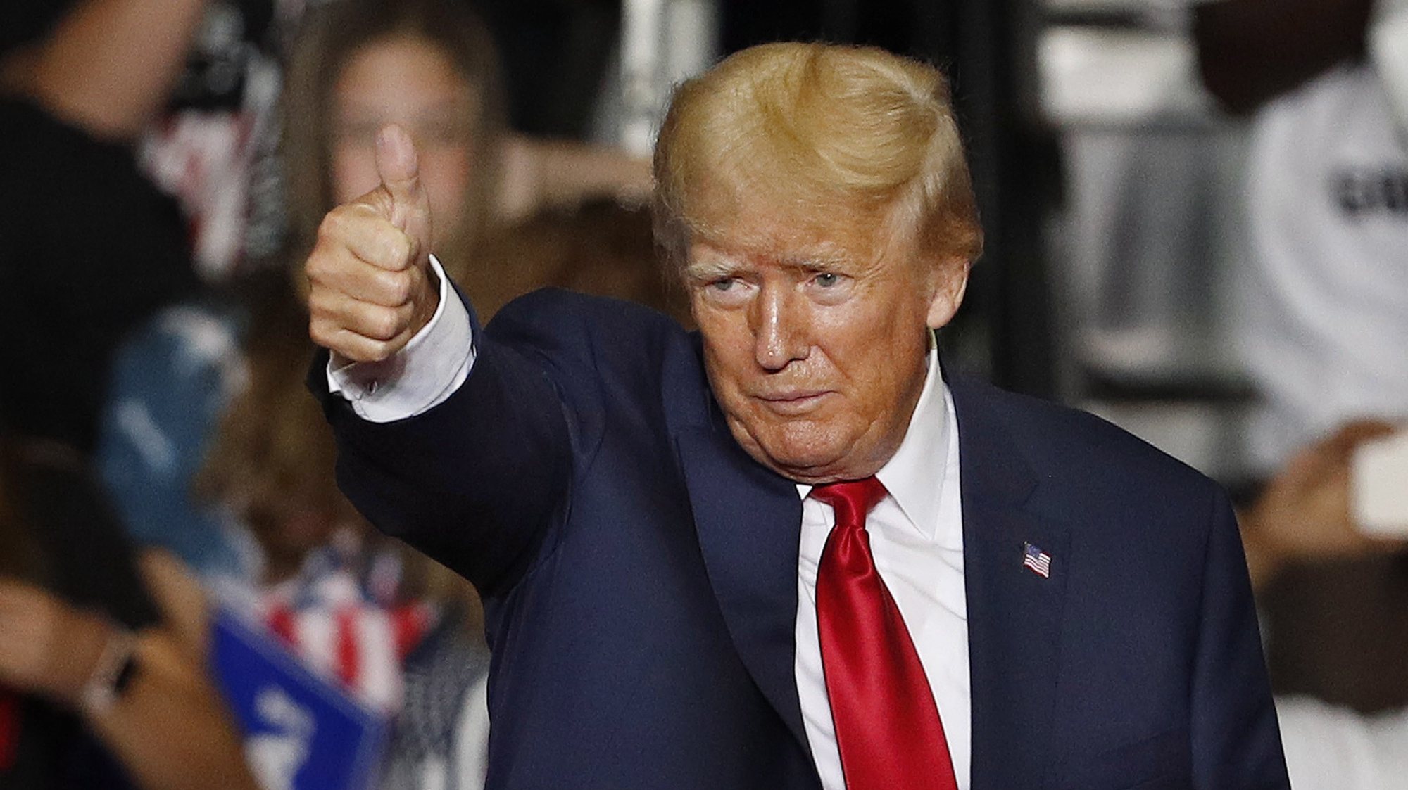 epa10190825 Former US President Donald Trump gestures during a Save America rally at the Covelli Centre in Youngstown, Ohio, USA, 17 September 2022.  EPA/DAVID MAXWELL