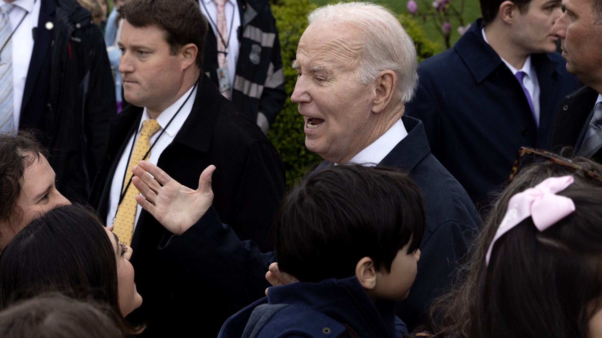 epa11254815 US President Joe Biden (C) greets visitors during the 2024 Easter Egg Roll on the South Lawn of the White House in Washington, DC, USA, 01 April 2024. About forty thousand people were expected to attend the 2024 Easter Egg Roll, which continues the theme of &#039;EGGucation&#039; and provides a variety of learning activities for children.  EPA/MICHAEL REYNOLDS / POOL