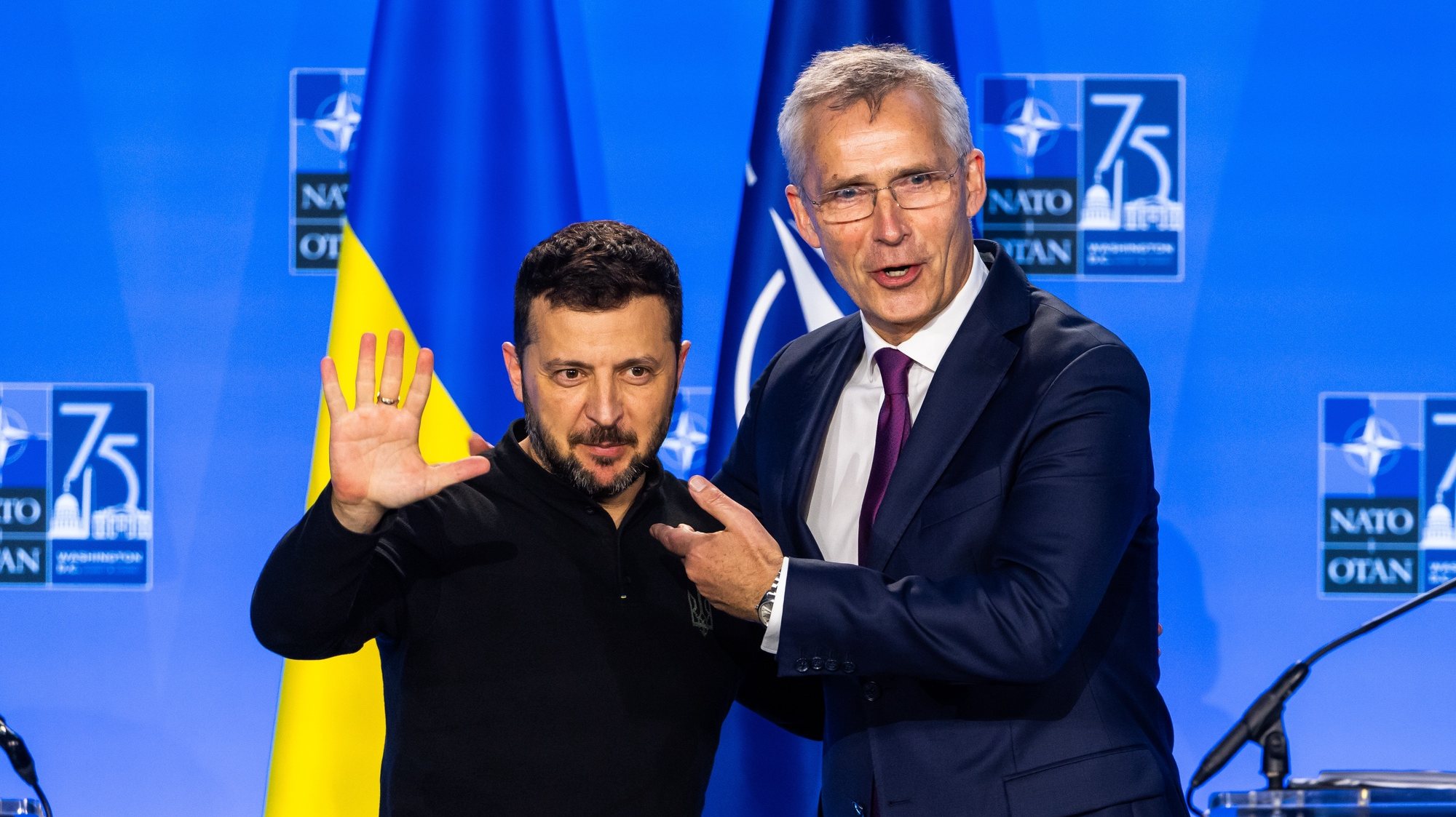 epa11473085 President of Ukraine Volodymyr Zelensky (L) hugs NATO Secretary General Jens Stoltenberg (R) after the two held a press conference at the 2024 North Atlantic Treaty Organization (NATO) conference in Washington, DC, USA, 11 July 2024. NATO members are using the gathering as an opportunity to project their ongoing support for Ukraine as the country continues to fend off Russian aggression.  EPA/JIM LO SCALZO