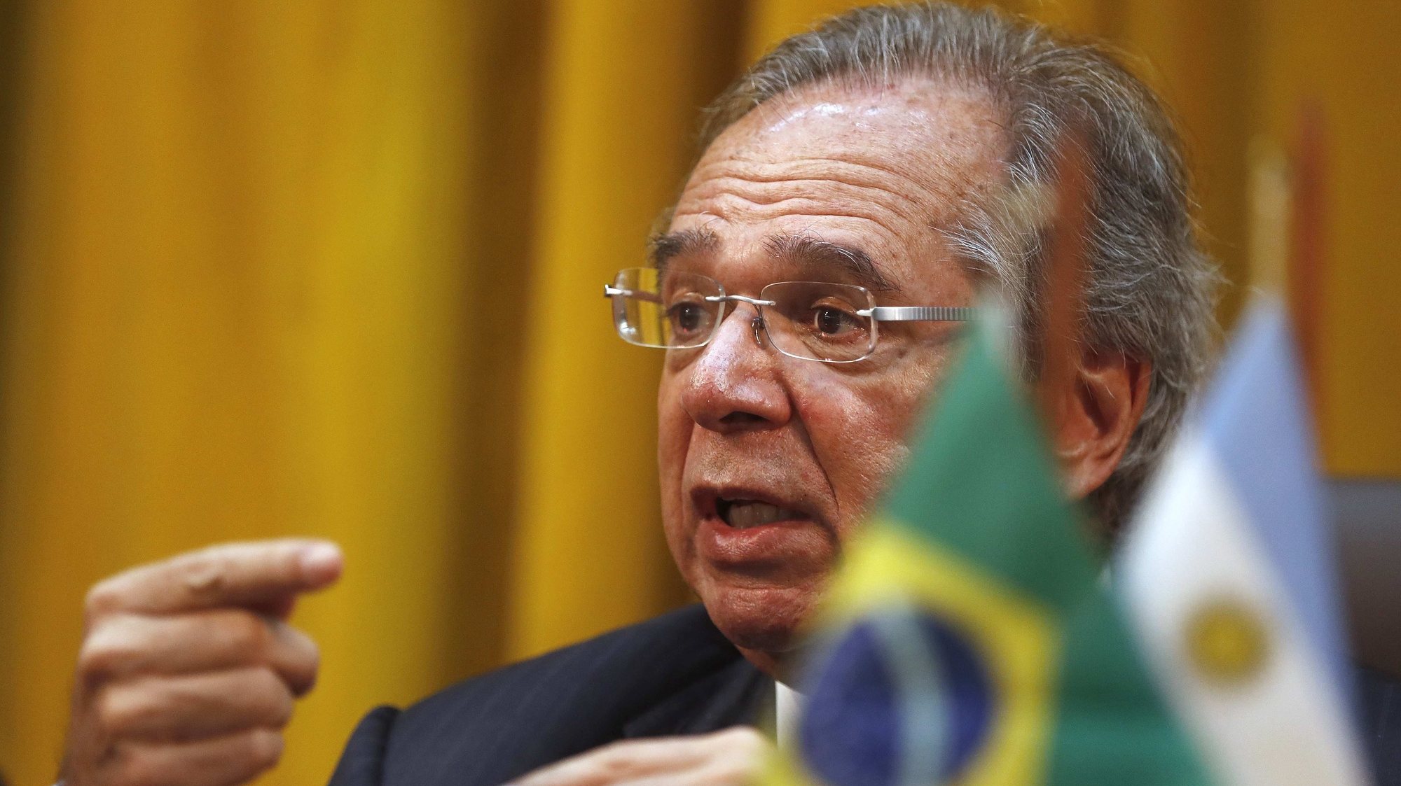 epa07824116 Brazilian Minister of Economy Paulo Guedes speaks during a press conference after a meeting with the Minister of Production and Labor of Argentina, Dante Sica, in Rio de Janeiro, Brazil, 06 September 2019. Both nations again postponed the date for the start of bilateral free trade on cars. It will be now by 2029, in an agreement signed Friday that establishes &quot;more stable rules&quot; for the exchange and despite reaffirming their commitment to economic opening. Automobile trade is one of the main exceptions within the Mercosur free trade block, and is regulated by bilateral and non-multilateral agreements.  EPA/MARCELO SAYAO