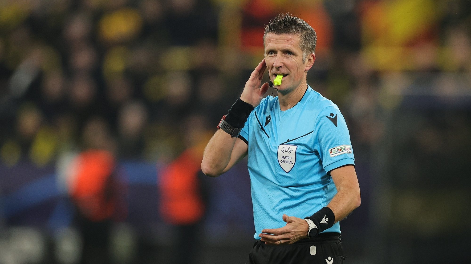 epa11218992 Referee Daniele Orsato reacts during the UEFA Champions League Round of 16, 2nd leg soccer match between Borussia Dortmund and PSV Eindhoven, in Dortmund, Germany, 13 March 2024.  EPA/FRIEDEMANN VOGEL