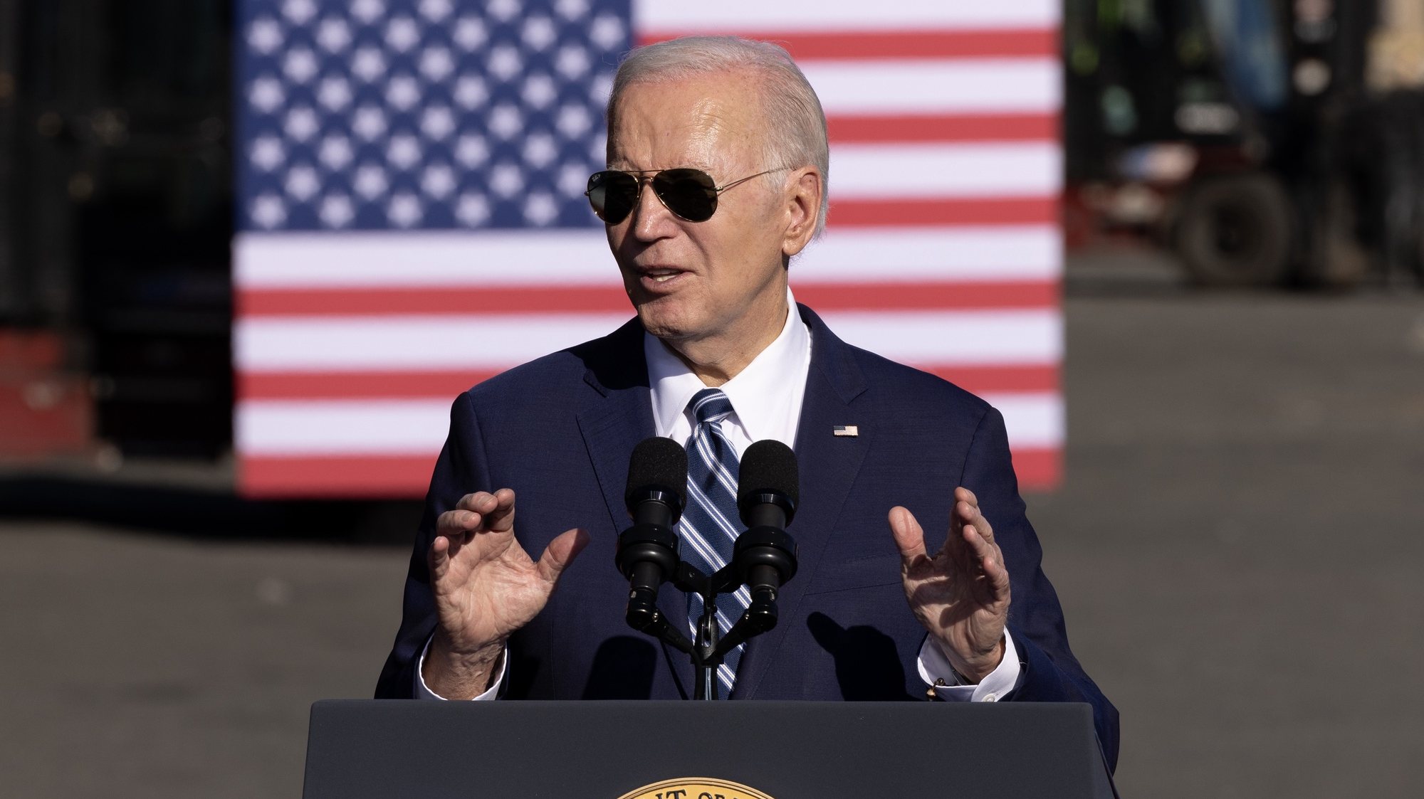 epa10917897 US President Joe Biden delivers remarks at the Tioga Marine Terminal in Philadelphia, Pennsylvania, USA, 13 October 2023. Biden discussed his economic policies known as Ã”BidenomicsÃ• in relation to clean energy, union jobs and infrastructure.  EPA/MICHAEL REYNOLDS
