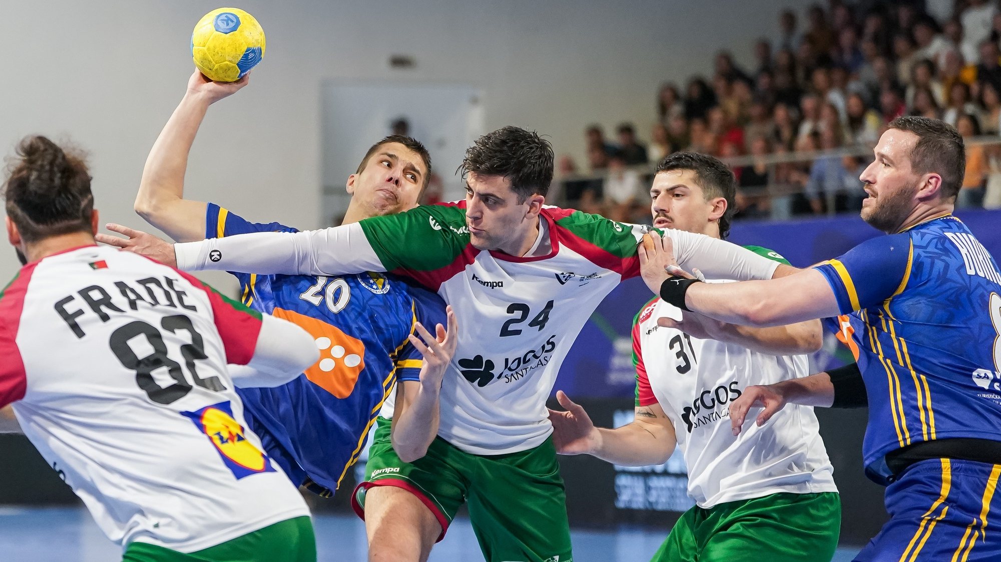 Cavalcanti (C) of Portugal in action against Knezevic (2nd L) of Bosnia Herzegovina during the IHF WCh 2025 Play-Off first hand handball match between Portugal and Bosnia Herzegovina, in Guimarães, Portugal, 09 May 2024. HUGO DELGADO/LUSA