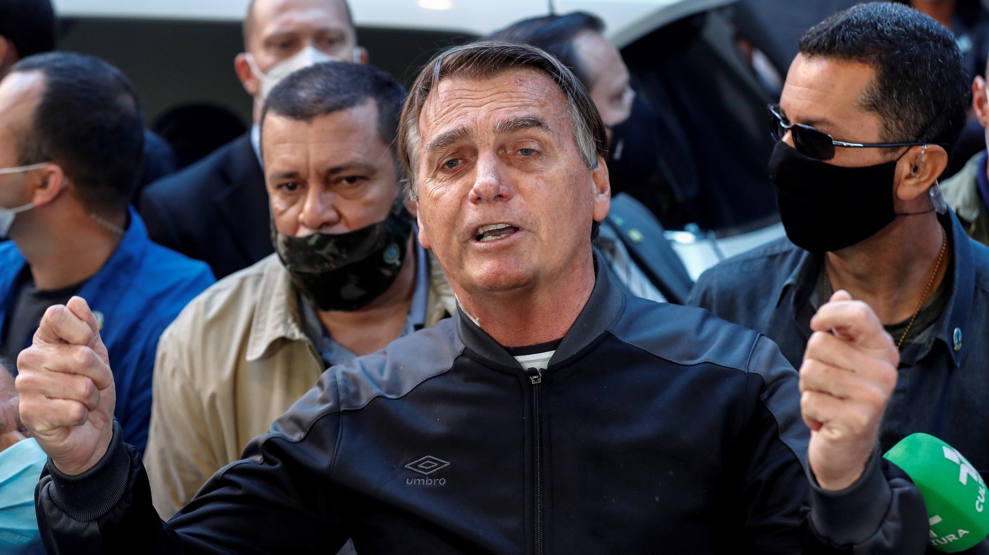 epa09351993 Brazilian President Jair Bolsonaro delivers remarks after he was discharged from Vila Nova Star Hospital, in Sao Paulo, Brazil, 18 July 2021. Bolsonaro was admitted to the Armed Forces Hospital in Brasilia on 14 July for chronic hiccups and abdominal pain and transferred to Sao Paulo the same day to treat an intestinal obstruction.  EPA/Sebastiao Moreira