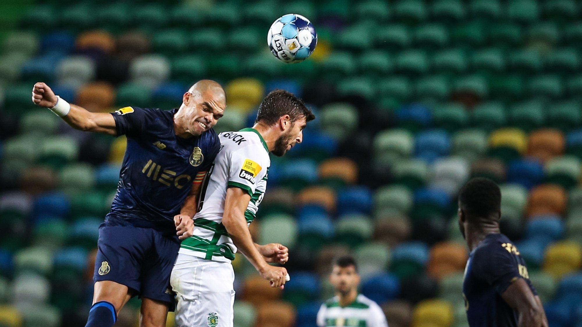Sporting&#039;s Paulinho (R) in action against FC Porto&#039;s Pepe (L) during the Portuguese First League soccer match between Sporting and FC Porto at José de Alvalade Stadium in Lisbon, Portugal, 11 September 2021. RODRIGO ANTUNES/LUSA