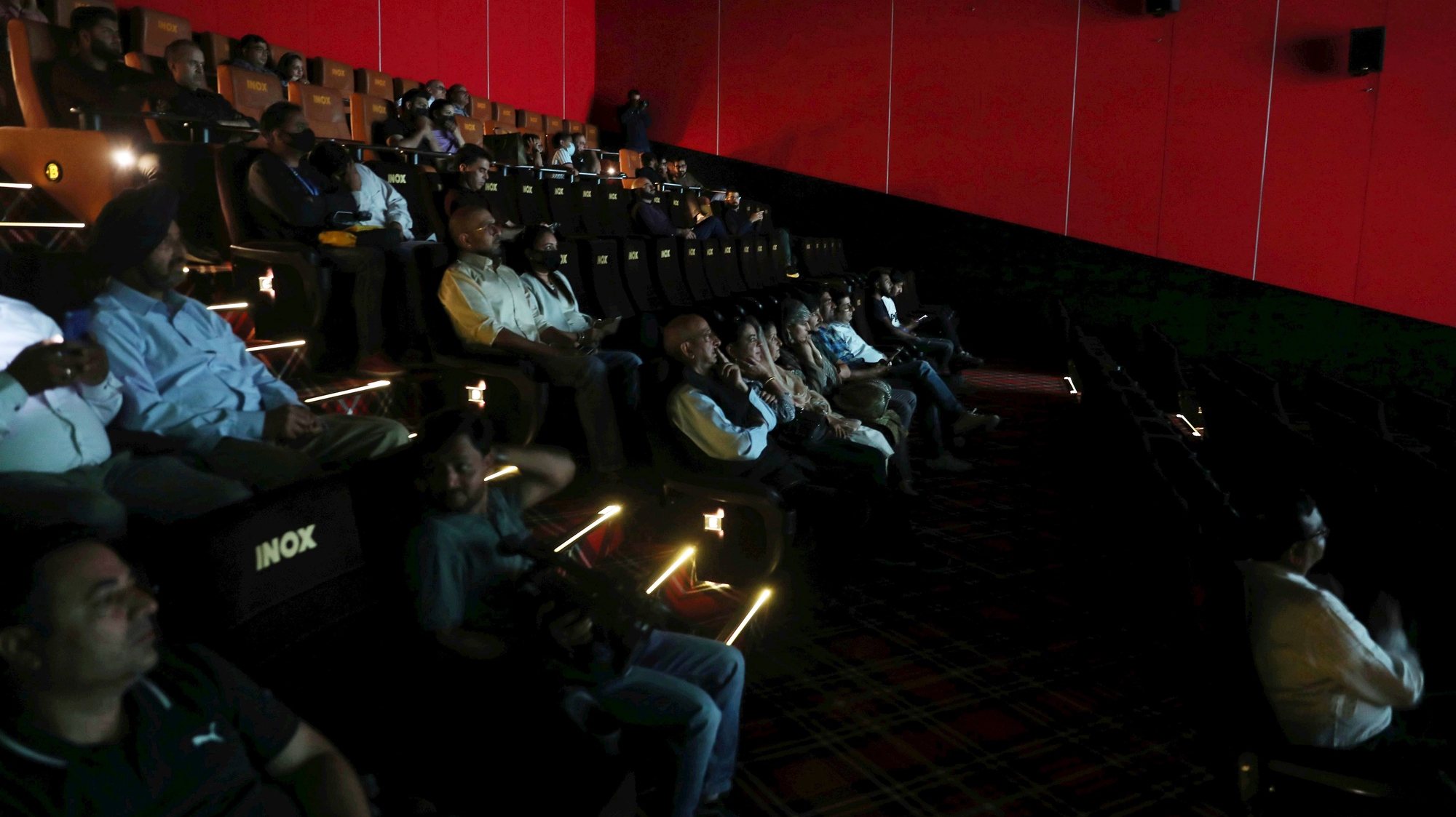 epa10215143 Media representatives and officials watch the screening of the Bollywood movie &#039;Vikram Vedha&#039; at the &#039;INOX&#039; multiplex cinema in Srinagar, the summer capital of Indian Kashmir, 30 September 2022. &#039;INOX&#039; is the first multiplex movie theater in Kashmir that will be thrown open for the public from 01 October 2022 on. The country&#039;s governor on 20 September inaugurated the cinema, marking the formal reopening of cinemas in Kashmir after a 33 years closure that was ordered in 1989 by the militant organization &#039;Allah Tigers&#039;. Although the situation improved drastically since the deadly period of militancy in the 1990s, most cinemas remained closed apart from some unsuccessful attempts to reopen some cinema houses.  EPA/FAROOQ KHAN
