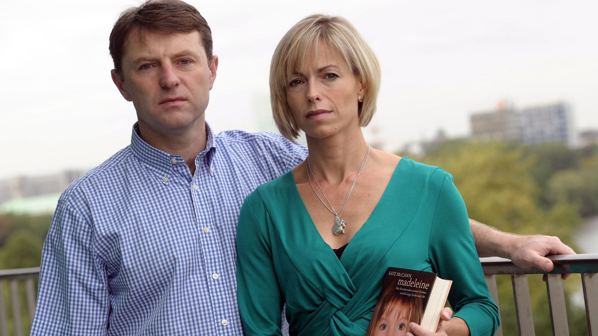 epa02919097 The parents of the missing British girl Maddie, Kate and Gerry McCann, present their new book on a hotel balcony in Hamburg, Germany, 16 September 2011. Maddie, Madeleine McCann disappeared four years ago without a trace from the family&#039;s hotel room in Portugal. In an extraordinary campaign, the parents tried to find her, but without results. Now they speak about their time of suffering, their hopes and throwbacks in their book &#039;Madeleine. Our daughters disappearance and the continuing search for her&#039; by Kate McCann.  EPA/CHRISTIAN CHARISIUS
