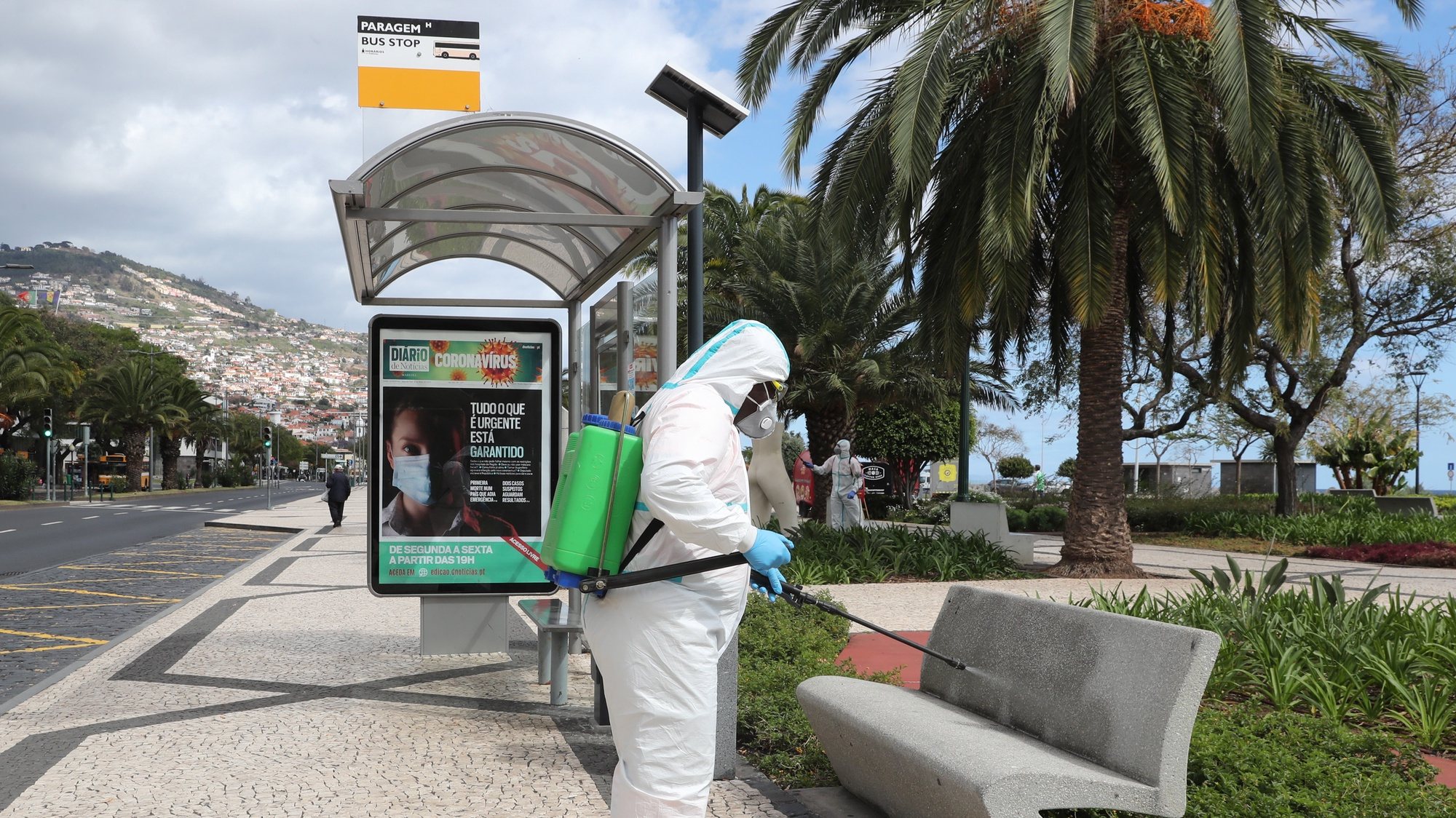 epa08312093 A municipal employee disinfects a street in the centre of Funchal due to the epidemic of covid-19, Madeira Island, Portugal, 21 March 2020. In Portugal, there are 12 deaths and 1,280 confirmed infections. Portugal is in a state of emergency from 00:00 on March 19th until 23:59 on 02 April. Countries around the world are taking increased measures to stem the widespread of the SARS-CoV-2 coronavirus which causes the Covid-19 disease.  EPA/HOMEM DE GOUVEIA