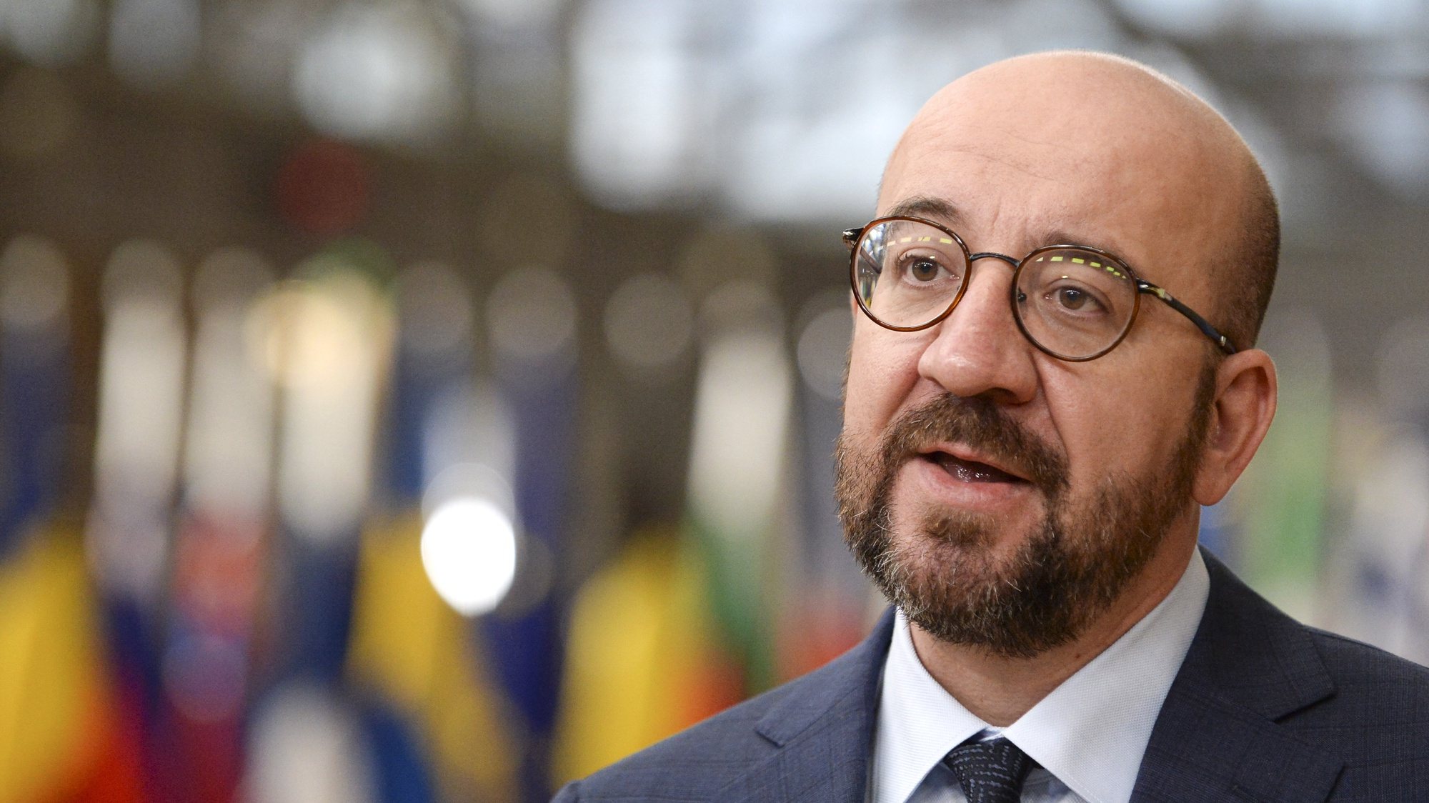epa08749370 European Council President Charles Michel speaks to the media as he arrives for the second and last day of a face-to-face EU summit in Brussels, Belgium, 16 October 2020.  EPA/JOHANNA GERON / POOL