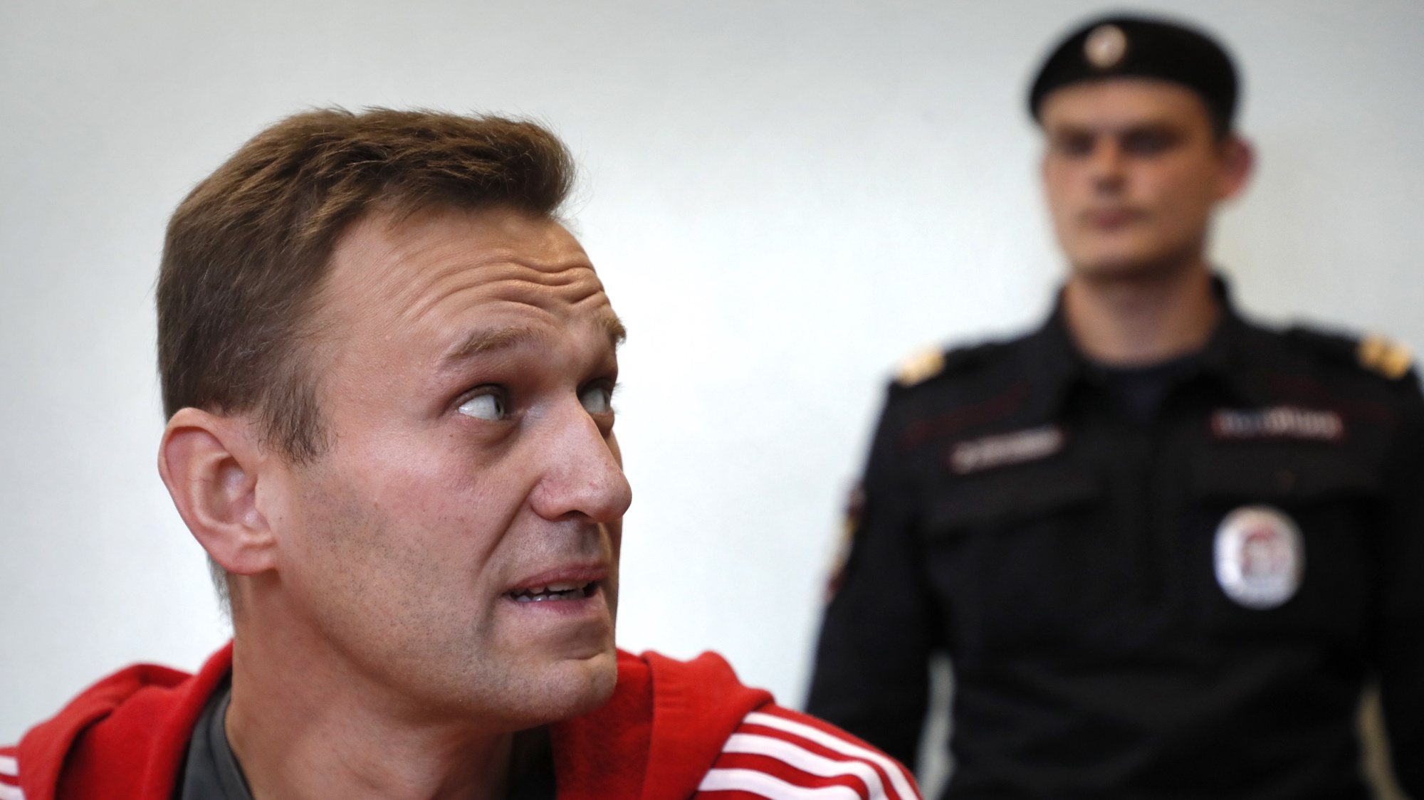 epa08908891 (FILE) - Russian opposition leader Alexei Navalny (L) attends a hearing at the Simonovsky District court in Moscow, Russia, 22 August 2019 (reissued 29 December 2020). According to Navalny&#039;s lawyer, Russian officials threaten to jail Alexey Navalny for failing to comply with terms of a suspended sentence if he doesn&#039;t show up for a hearing in Moscow, Russia on 30 December 2020.  EPA/YURI KOCHETKOV *** Local Caption *** 55729299
