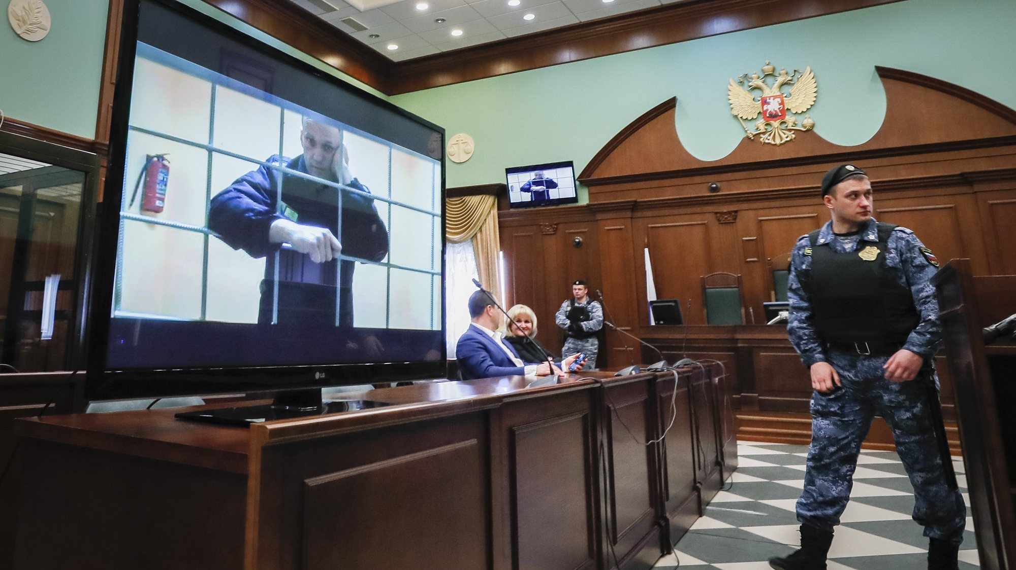 epa10481401 (FILE) - Russian opposition leader Alexei Navalny is shown on a monitor screen via video link from the penal colony No. 2 (IK-2) in Pokrov in Vladimir region, during a hearing of an appeal against Lefortovsky court sentence at the Moscow city court in Moscow, Russia, 24 May 2022 (reissued 21 February 2023). Russian troops on 24 February 2022, entered Ukrainian territory, starting a conflict that has provoked destruction and a humanitarian crisis. One year on, fighting continues in many parts of the country.  EPA/YURI KOCHETKOV  ATTENTION: This Image is part of a PHOTO SET