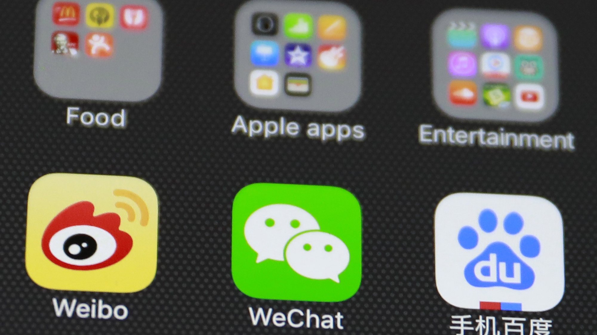 Icones de redes sociais chinesas como a Weibo