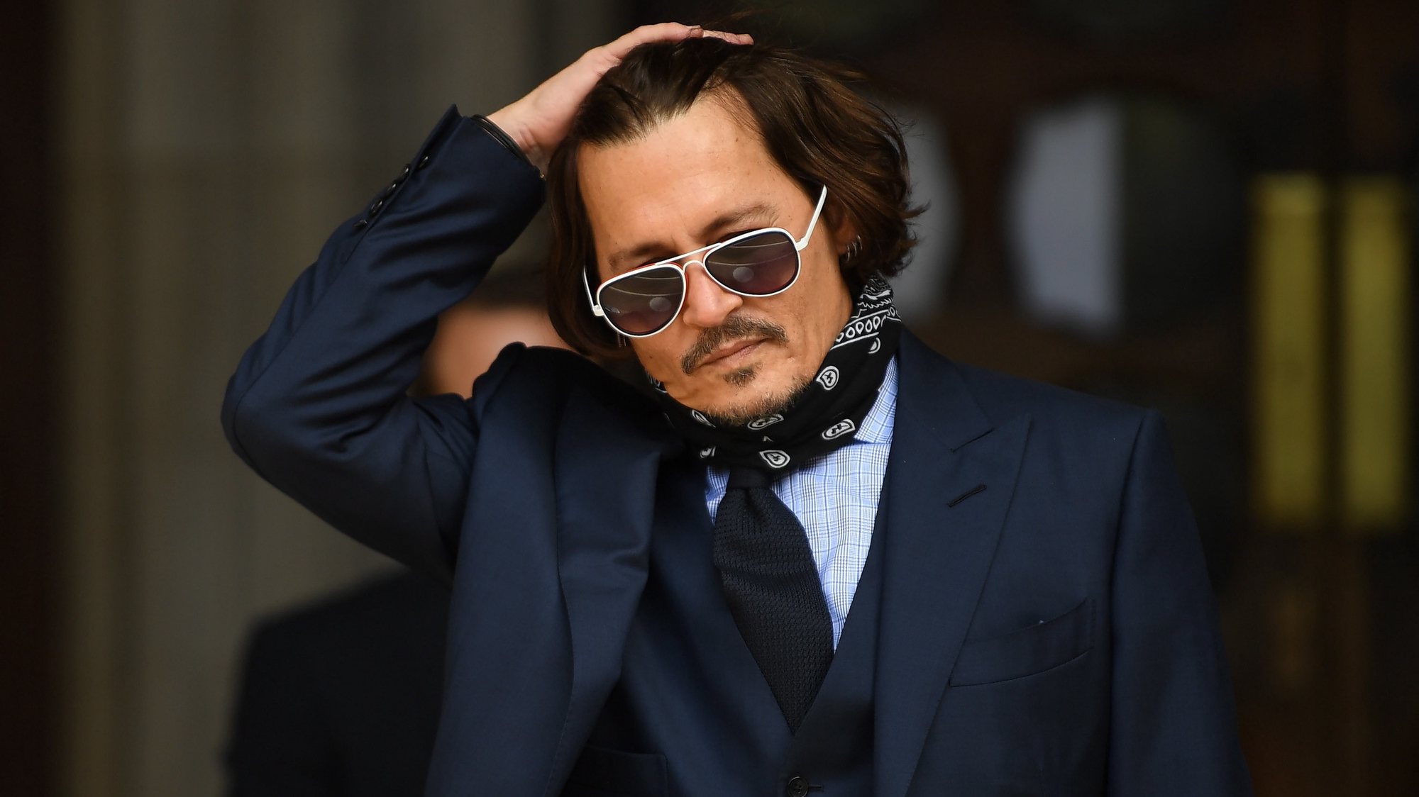 epa08792649 (FILE) - US actor Johnny Depp arrives at the Royal Courts of Justice in London, Britain, 14 July 2020 (reissued 02 November 2020). The UK High Court ruled against Depp in his libel trial against The Sun&#039;s newspaper publisher News Group Newspapers (NGN) over claims he abused his ex-wife, US actress Amber Heard, media reports state on 02 November 2020.  EPA/NEIL HALL *** Local Caption *** 56213511
