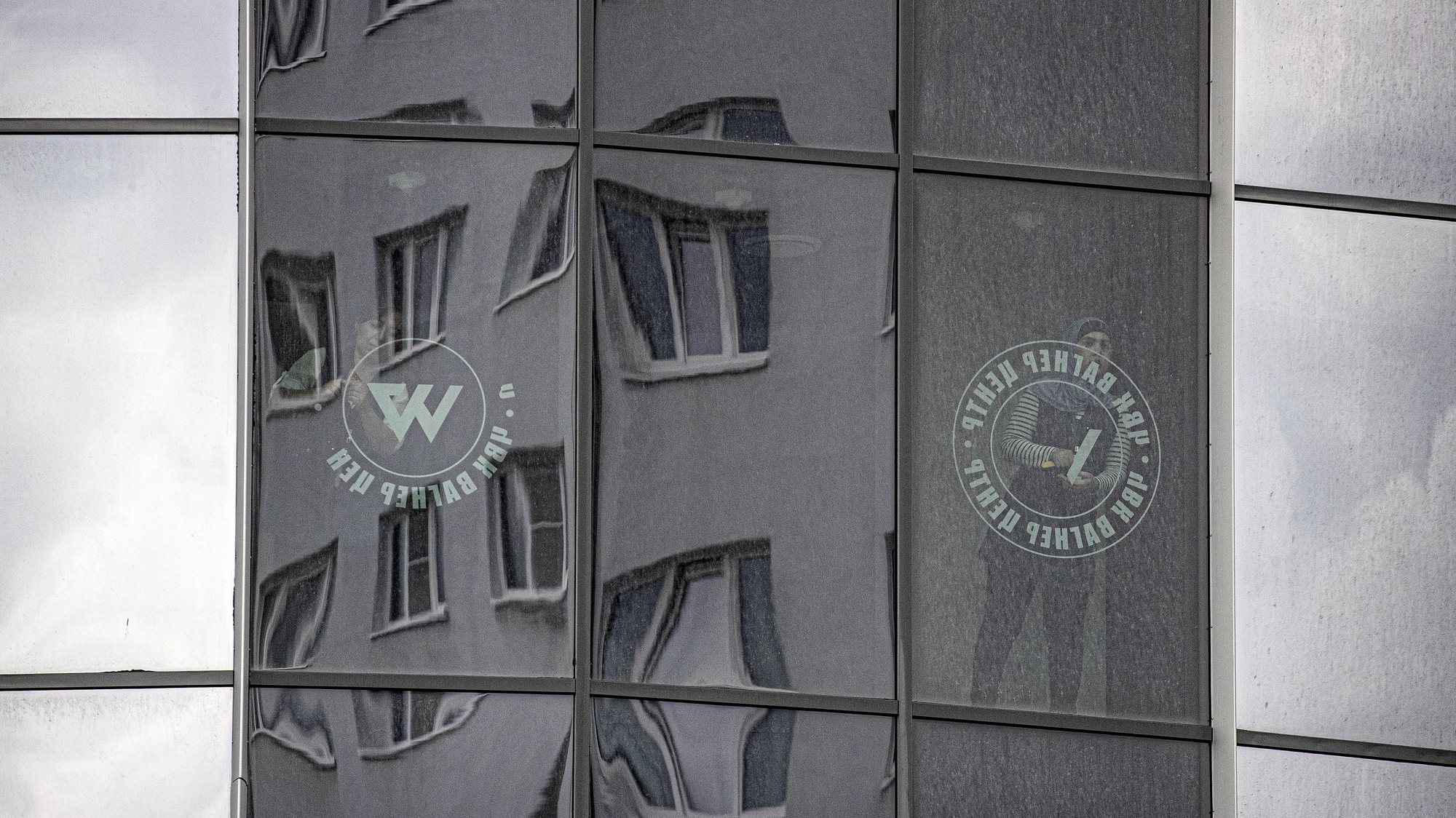 epa10722702 Workers remove the logo of the private military company (PMC) Wagner Group from the windows of the Sea Capital (Morskaya Stolitsa) business center, where Yevgeny Prigozhin&#039;s company rented several floors in St. Petersburg, Russia, 02 July 2023. On 23 June 2023, Wagner Group forces led by Prigozhin left the frontline in Ukraine and staged an &#039;armed mutiny&#039; against Russia&#039;s military leadership. Prigozhin claimed on 24 June 2023 that his troops had occupied the headquarters of the Southern Military District in Rostov-on-Don, Russia, a key city near the Ukrainian border. A deal negotiated by the Belarusian president with Prigozhin stopped the Wagner forces&#039; movement toward Moscow and ended the standoff, with Prigozhin and his fighters leaving the country.  EPA/ANATOLY MALTSEV