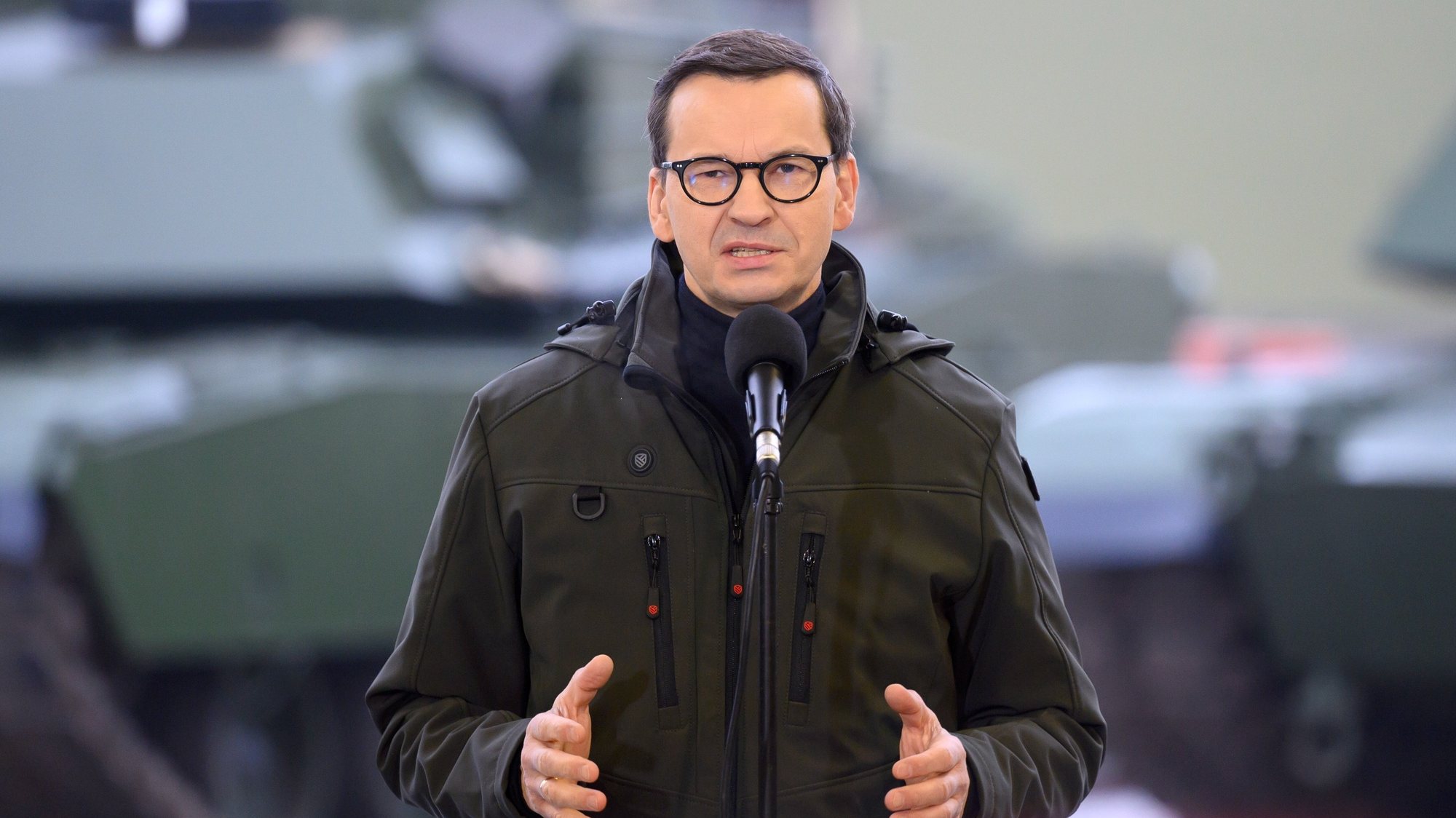 epa10377020 Polish Prime Minister Mateusz Morawiecki speaks during a meeting with soldiers, including crews training on Abrams tanks, at the Land Forces Training Center in Biedrusko, Poland 23 December 2022. According to the US Defense Security Cooperation Agency, the State Department approved a possible sale of M1A1 Abrams Main Battle Tanks and related equipment to Poland for an estimated cost of 3.75 billion dollars on 6 December 2022.  EPA/Jakub Kaczmarczyk POLAND OUT